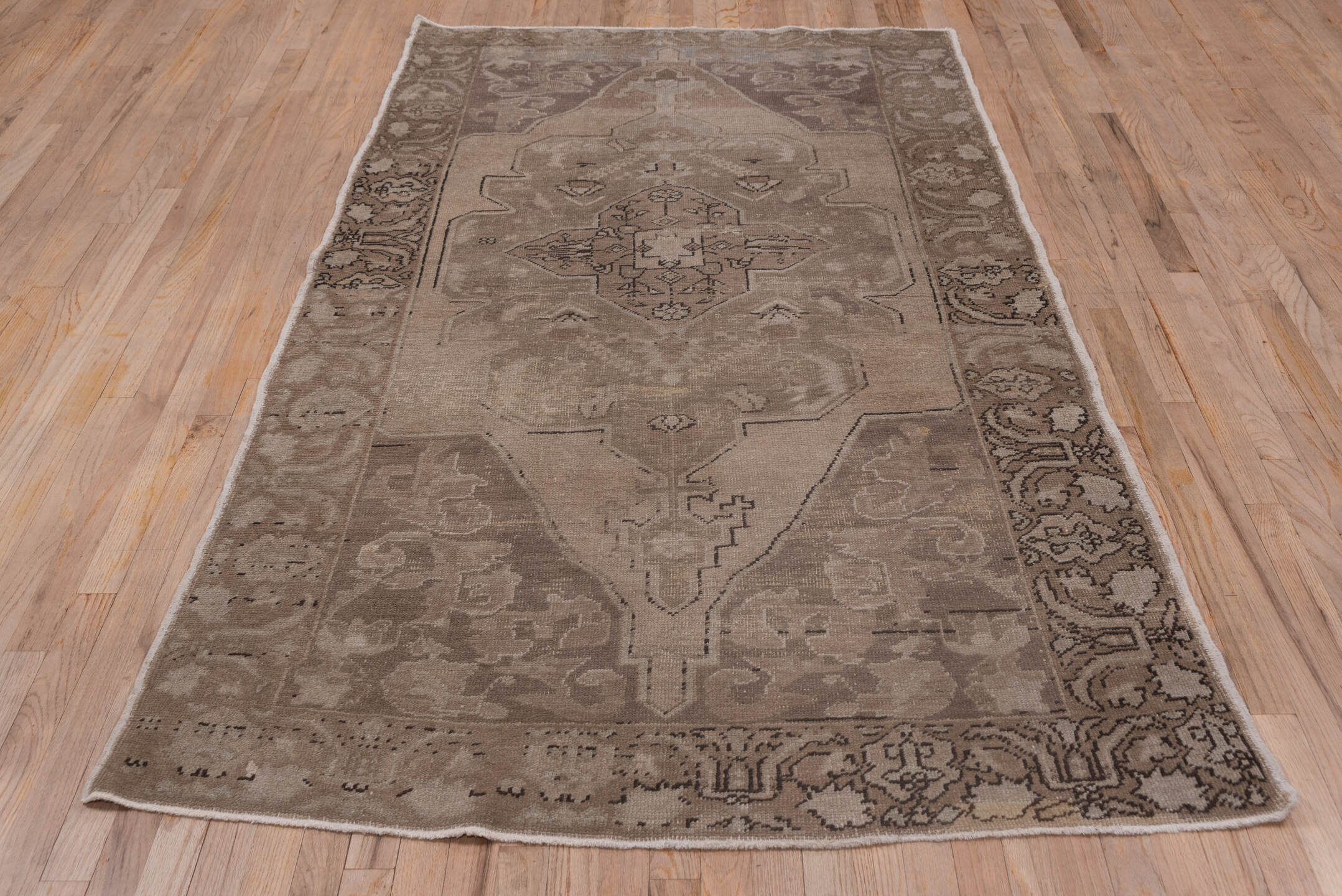 4' x 8' one-of-a-kind handmade vintage Oushak rug. Color palette: taupe, beige, brown, ivory, camel, charcoal, gray, black