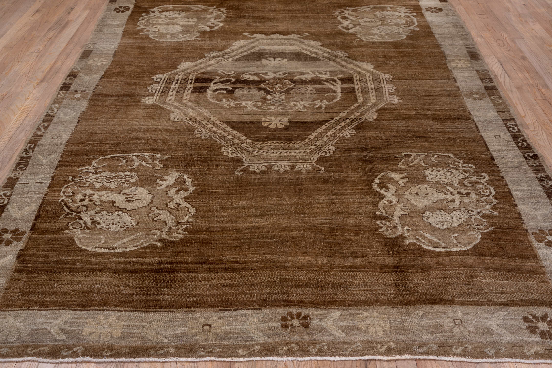 7' x 9' one-of-a-kind handmade vintage Oushak rug. Color palette: brown, taupe, ivory, beige, camel, gray