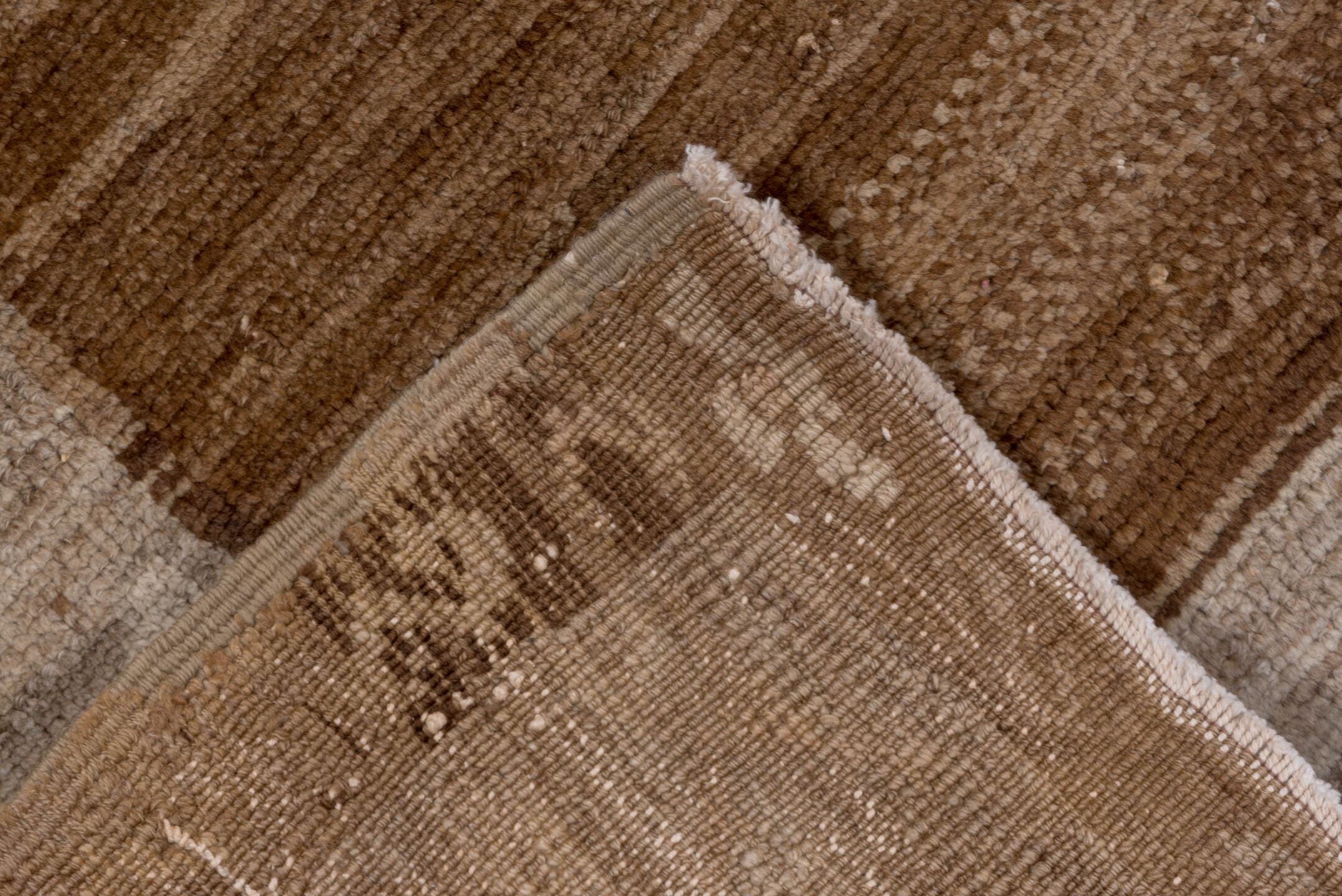 7' x 9' one-of-a-kind handmade vintage Oushak rug. Color palette: brown, taupe, ivory, beige, camel, gray