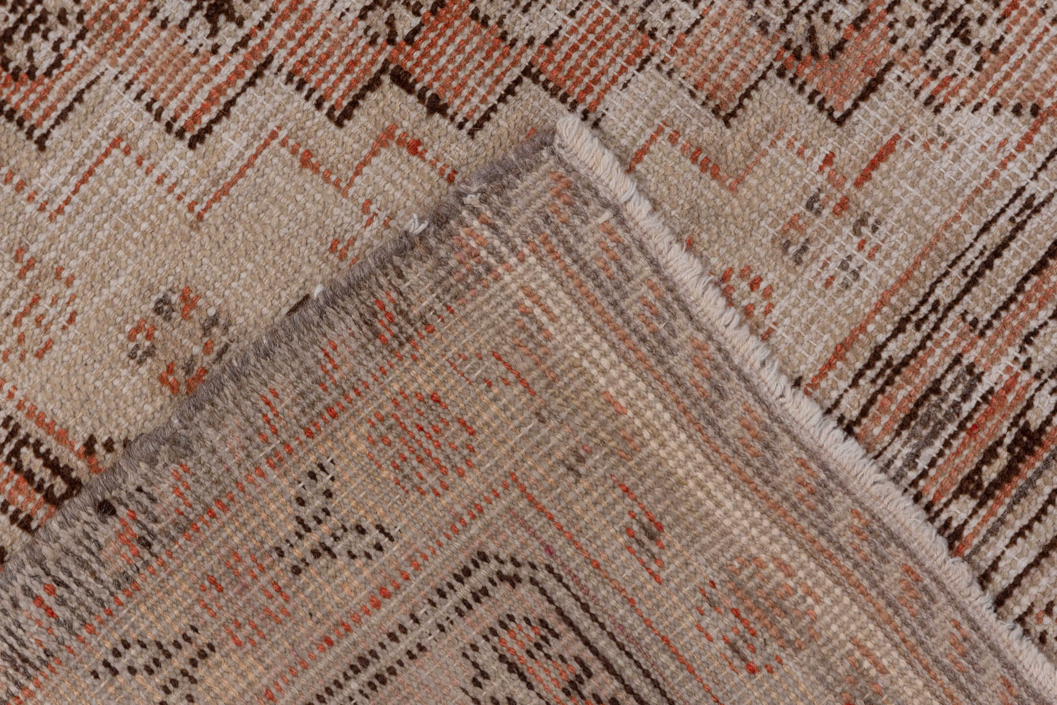 5' x 9' one-of-a-kind handmade antique Khotan medium size rug. Color palette: ivory, taupe, terra cotta, brown, peach