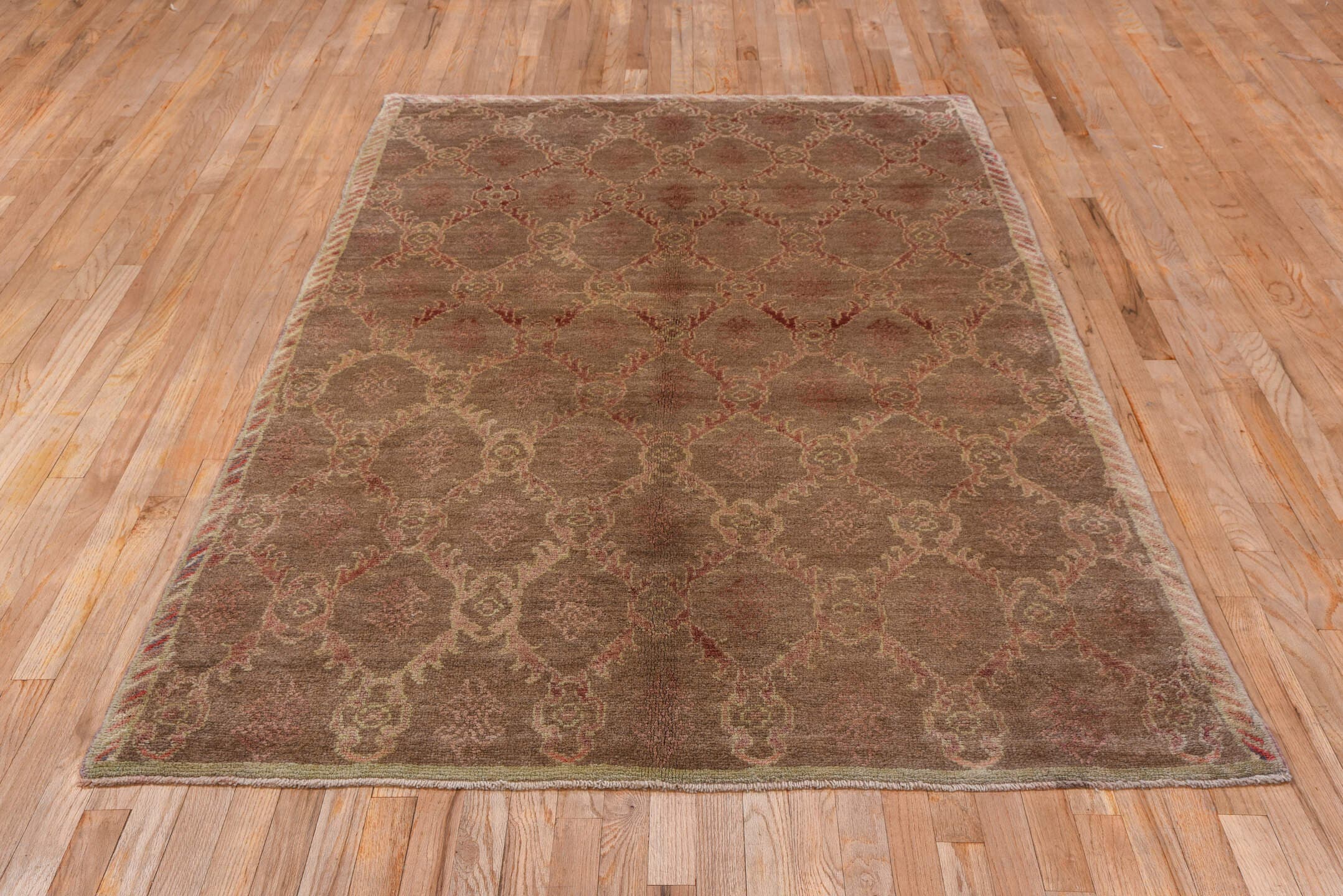 4' x 8' one-of-a-kind handmade vintage Tulu rug. Color palette: taupe, camel, rose, ivory, beige, gray, pink, red