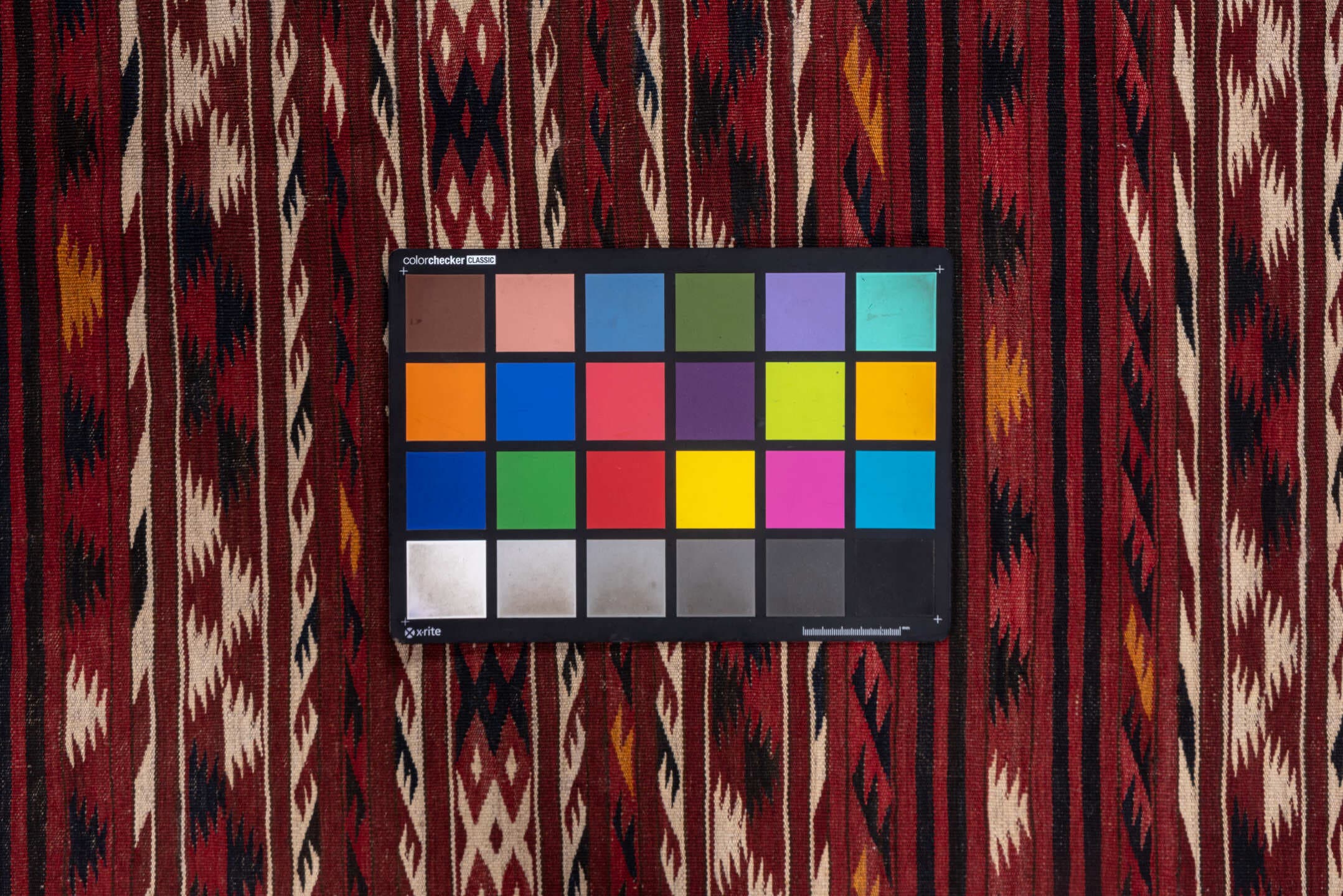 4' x 9' one-of-a-kind handmade vintage Kilim runner rug. Color palette: rust, burgundy, ivory, charcoal, gold, mahogany