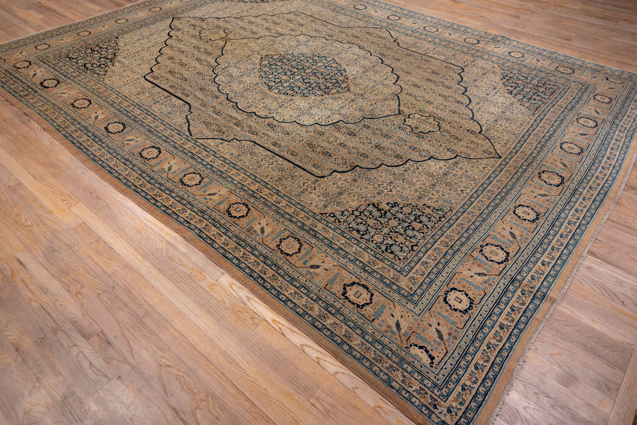 9' x 12' one-of-a-kind handmade antique Tabriz large size rug. Color palette: camel, ivory, navy, taupe, slate, sand, beige