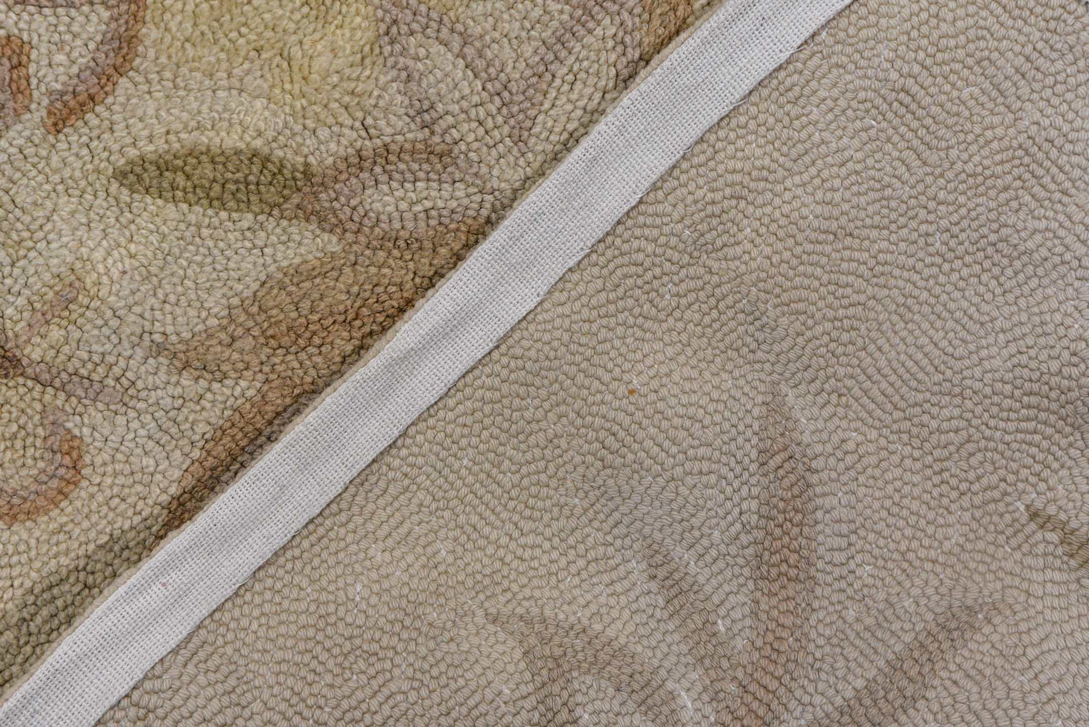 11' x 17' one-of-a-kind handmade antique Hooked oversize rug. Color palette: ivory, beige, taupe, cream, sand, gray