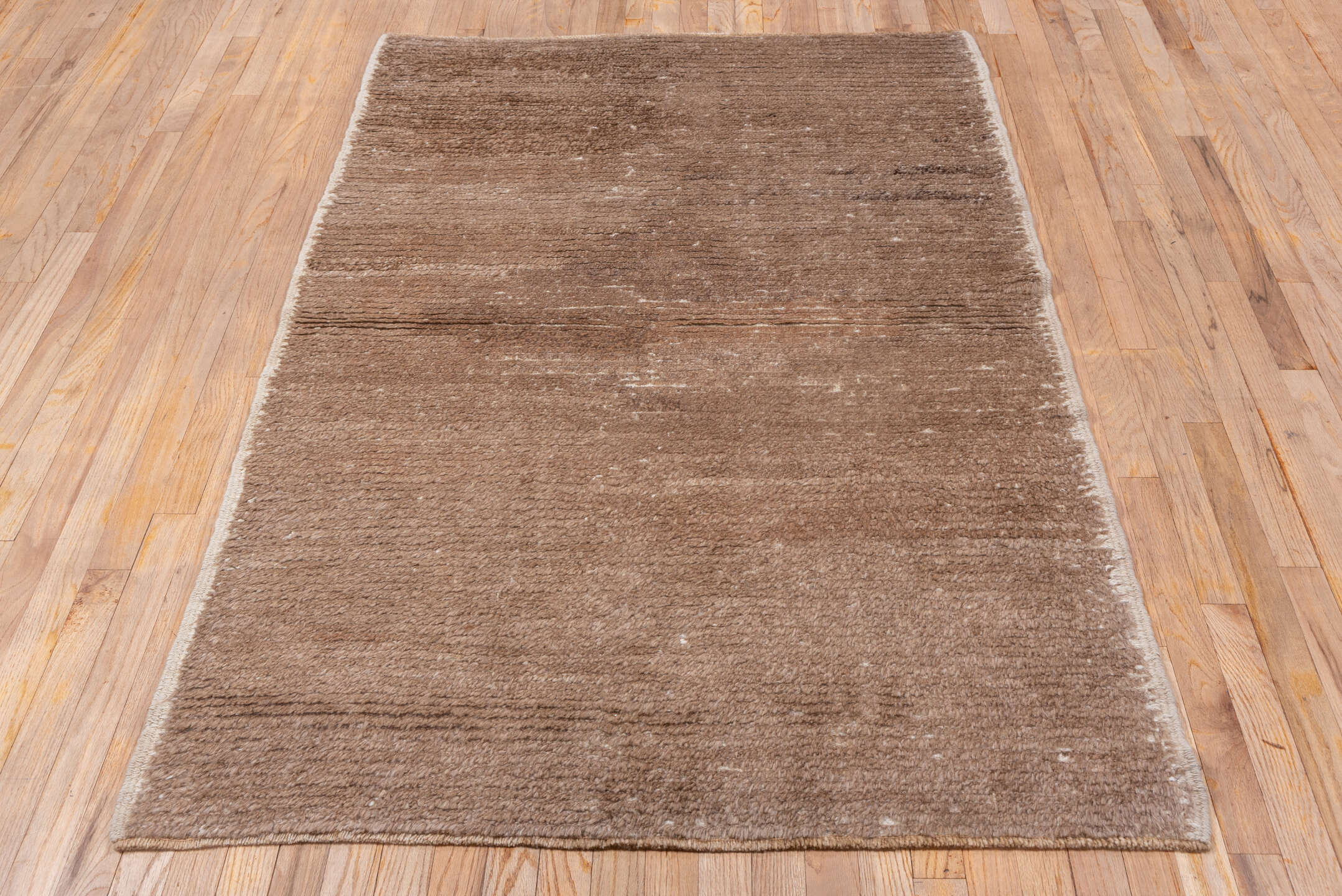 4' x 6' one-of-a-kind handmade vintage Tulu small size rug. Color palette: brown, gray, light gray, off-white, pink, snow