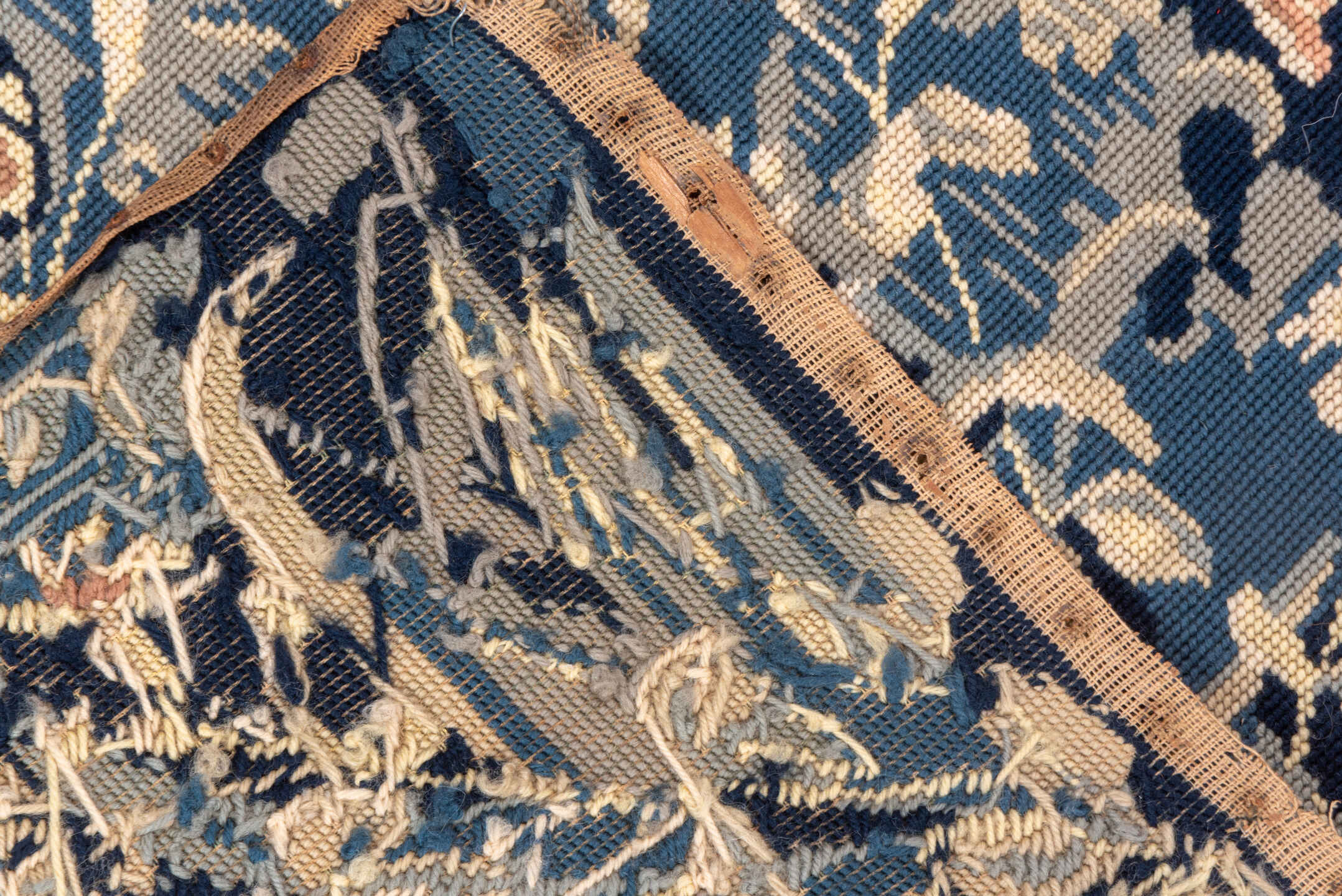 2' x 4' one-of-a-kind handmade vintage Needlepoint small size rug. Color palette: blue, ivory, rose, slate, taupe, navy