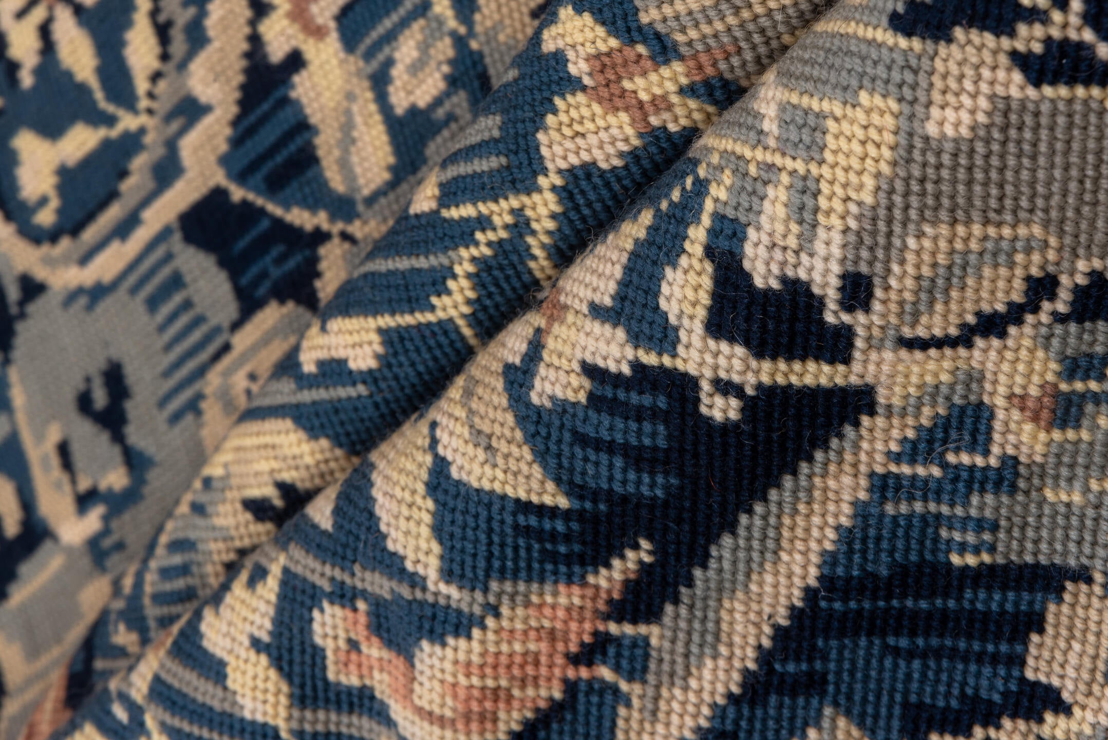 2' x 4' one-of-a-kind handmade vintage Needlepoint small size rug. Color palette: black, blue, brown, charcoal, dark gray