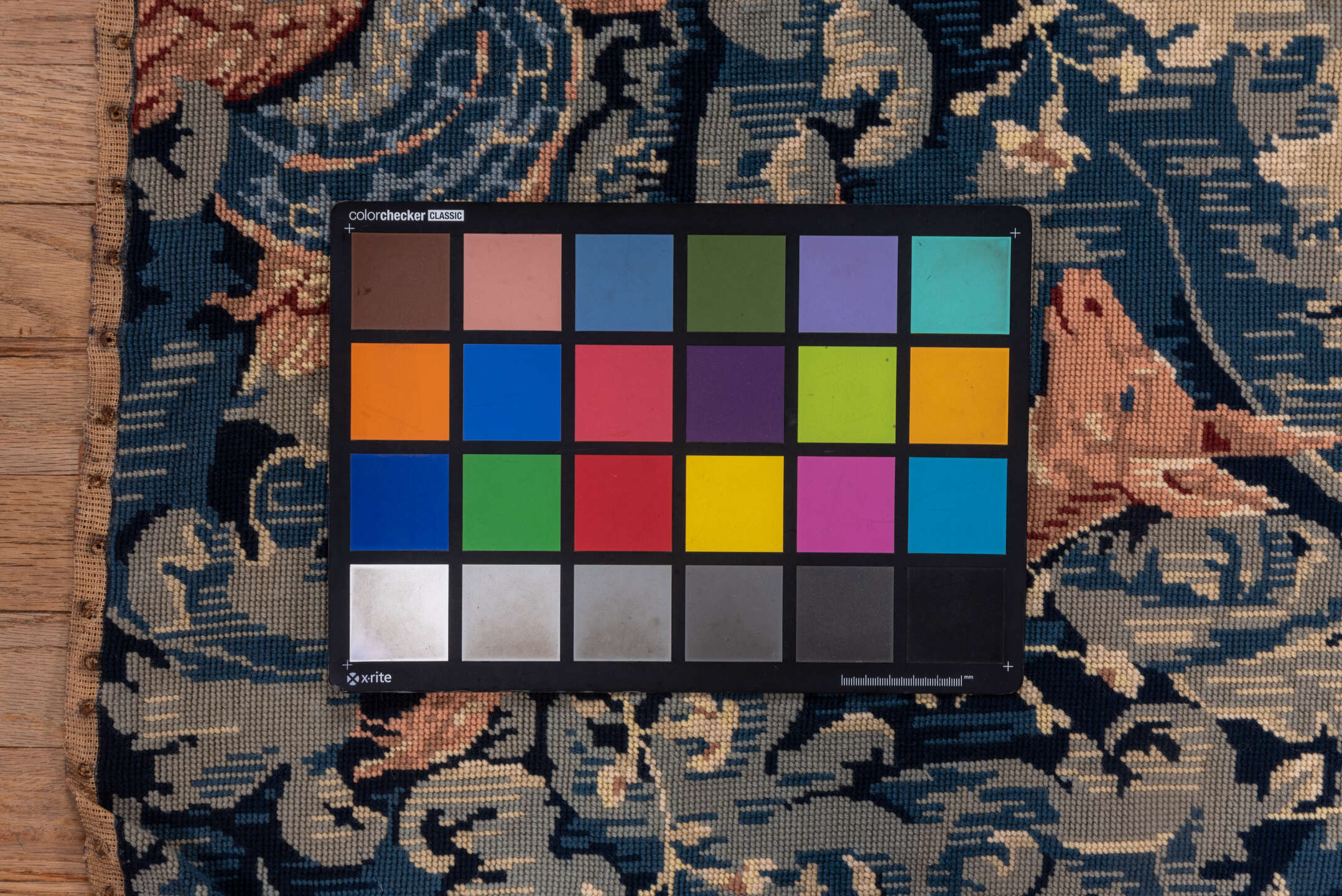 2' x 4' one-of-a-kind handmade vintage Needlepoint small size rug. Color palette: black, blue, brown, charcoal, dark gray