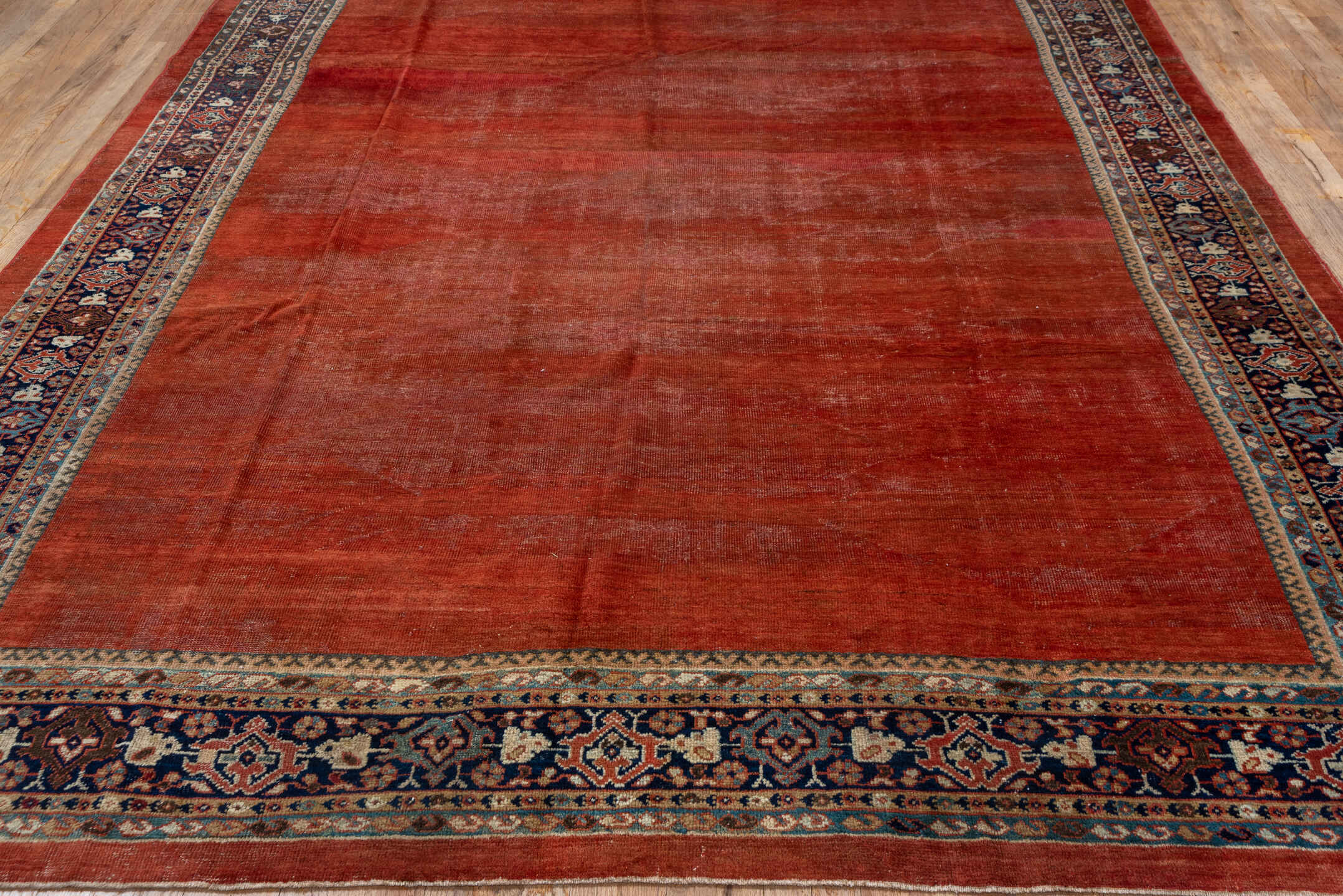 8' x 11' one-of-a-kind handmade antique Mahal large size rug. Color palette: terra cotta, rust, indigo, ivory, taupe, brown