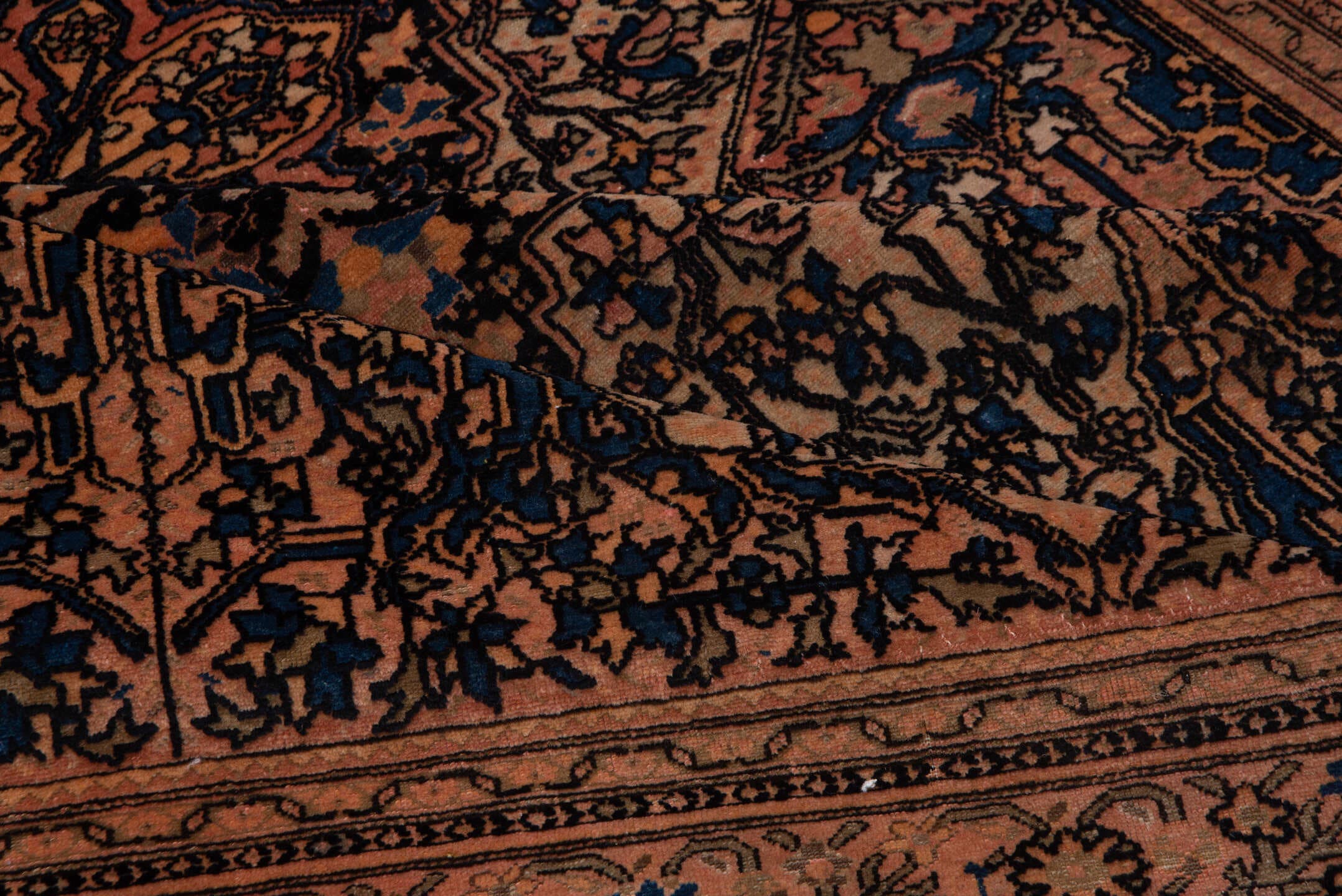 5' x 6' one-of-a-kind handmade vintage Malayer rug. Color palette: terra cotta, navy, ivory, rust, camel, slate, charcoal