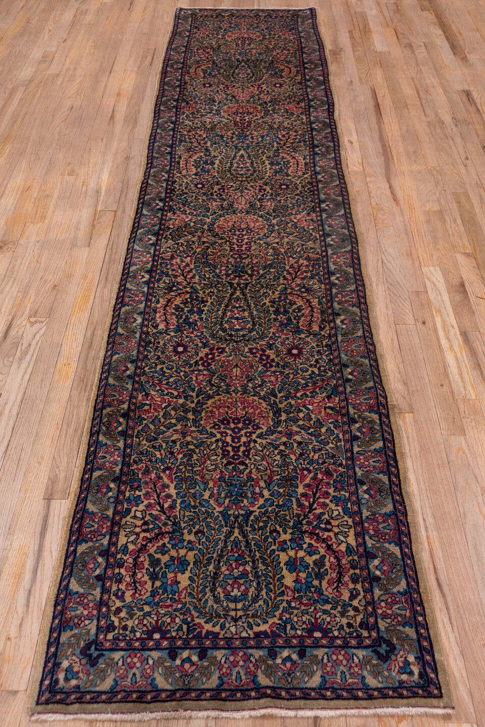 2' x 12' one-of-a-kind handmade antique Kerman runner rug. Color palette: navy, rose, ivory, soft blue, burgundy, taupe