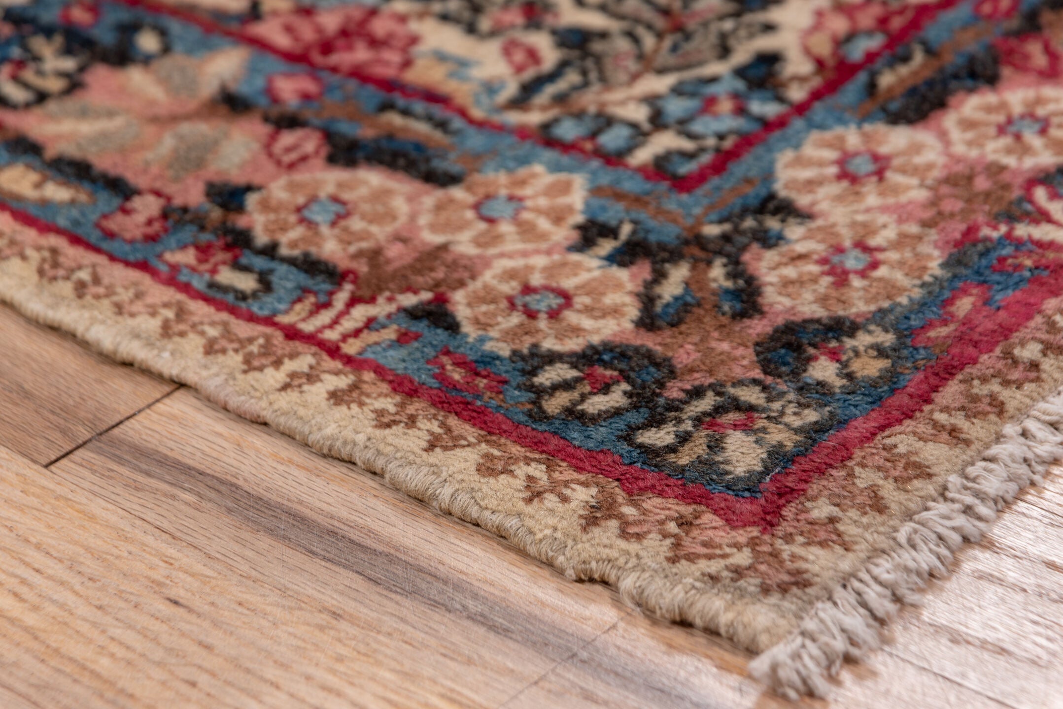 2' x 10' one-of-a-kind handmade antique Kerman runner rug. Color palette: ivory, navy, rose, dusty pink, rust, taupe