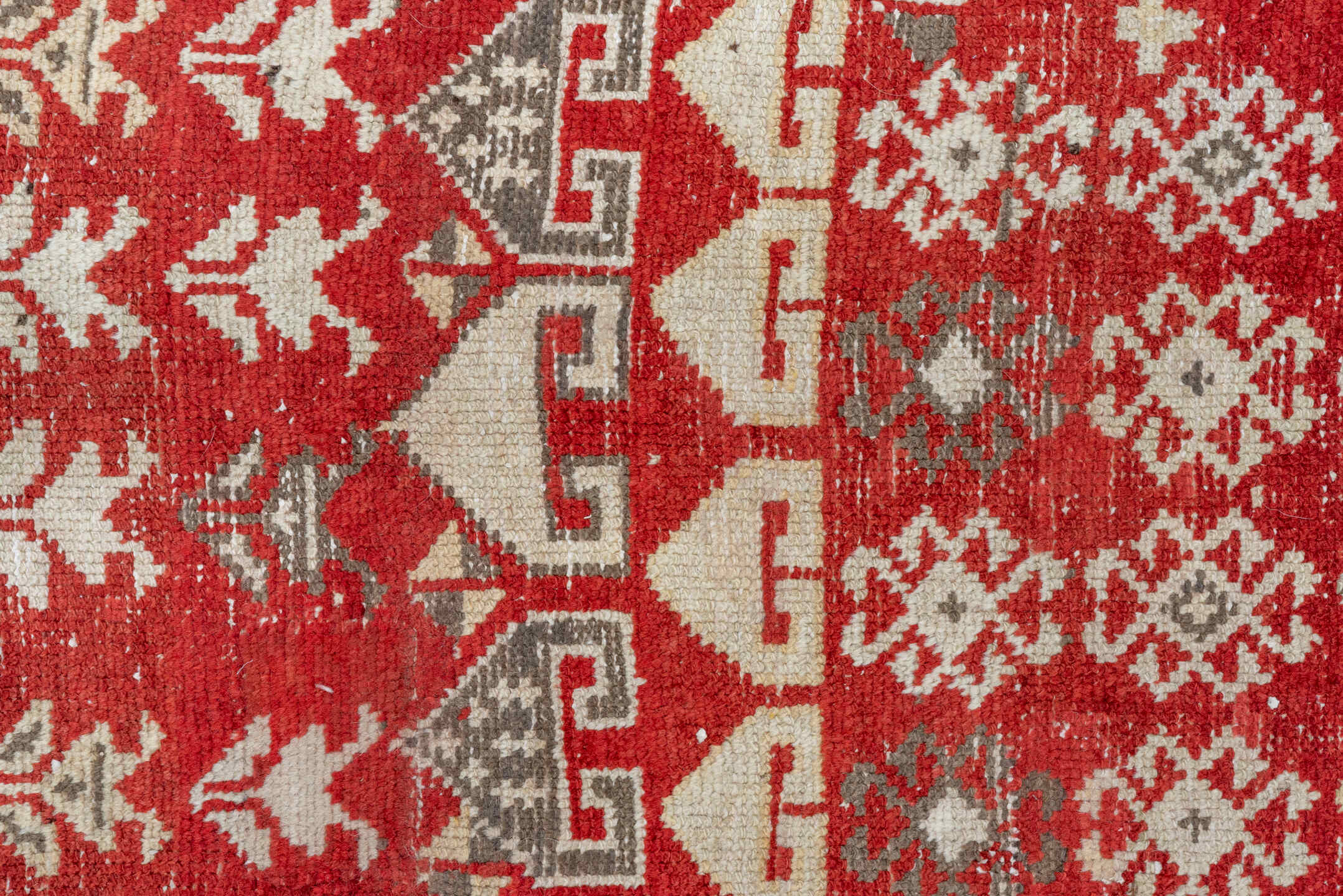 4' x 13' one-of-a-kind handmade antique Caucasian runner rug. Color palette: red, ivory, charcoal, taupe, sage, gray, black