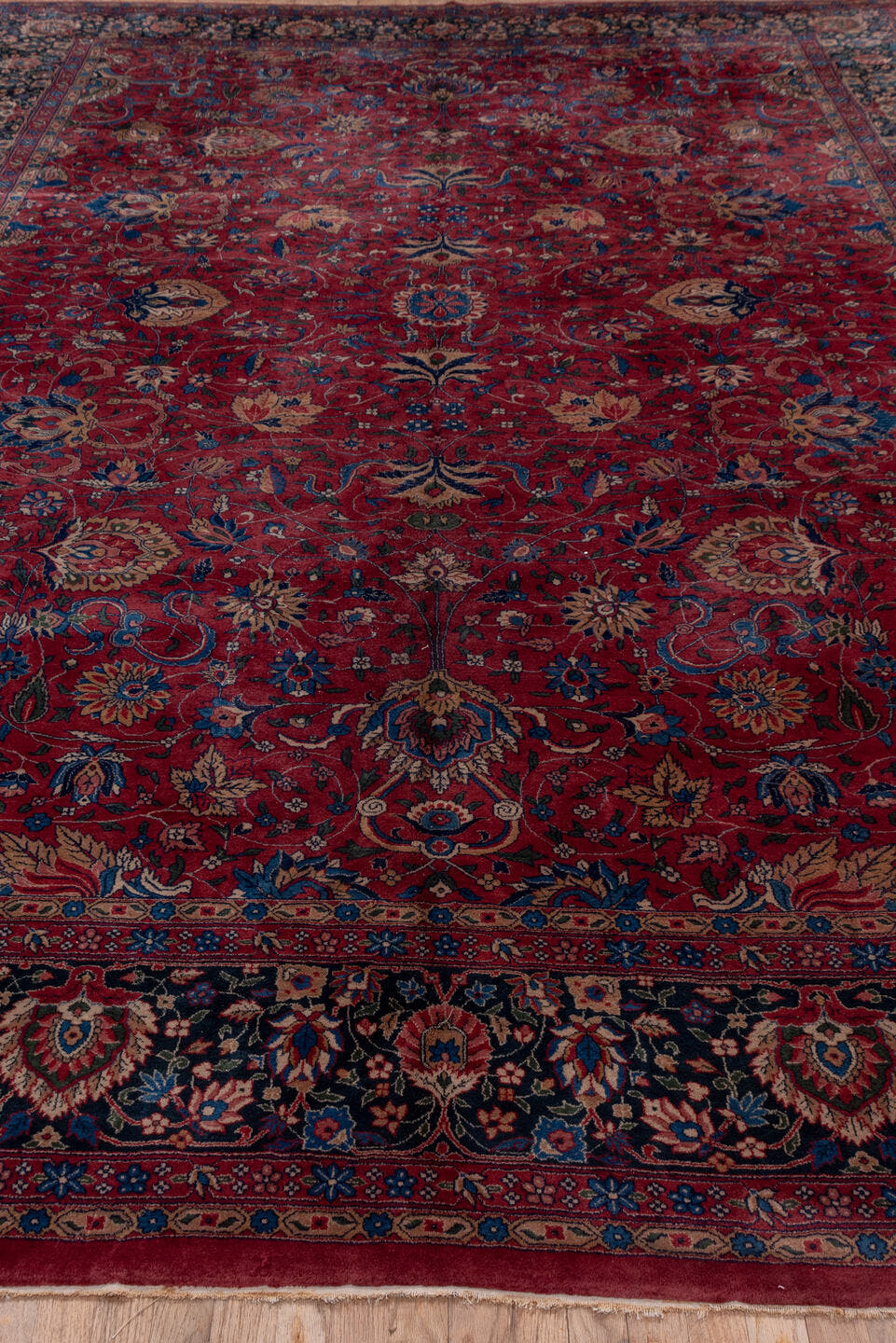 10' x 14' one-of-a-kind handmade antique Lahor large size rug. Color palette: red, navy, ivory, blue, rust, camel, rose