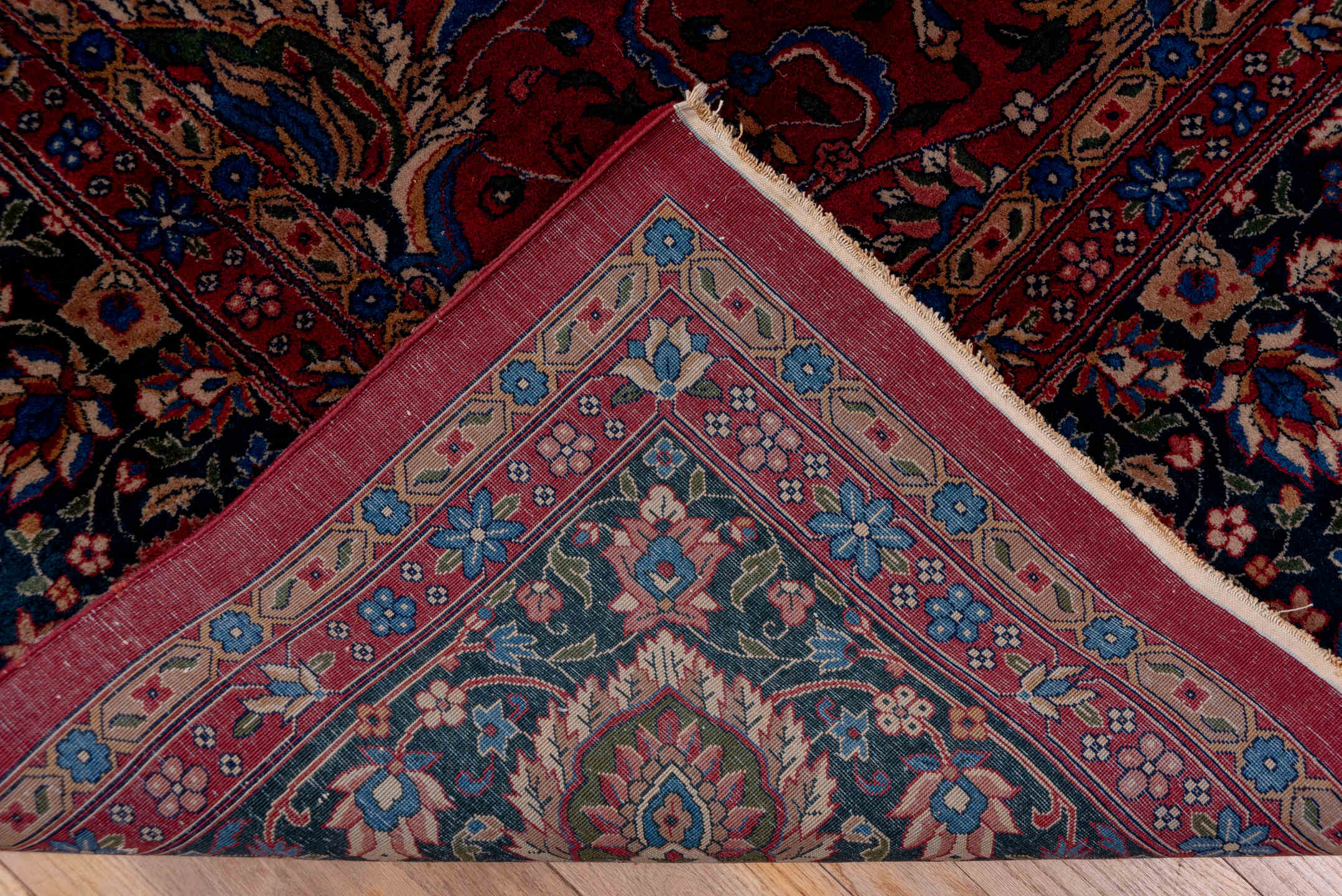 10' x 14' one-of-a-kind handmade antique Lahor large size rug. Color palette: red, navy, ivory, blue, rust, camel, rose