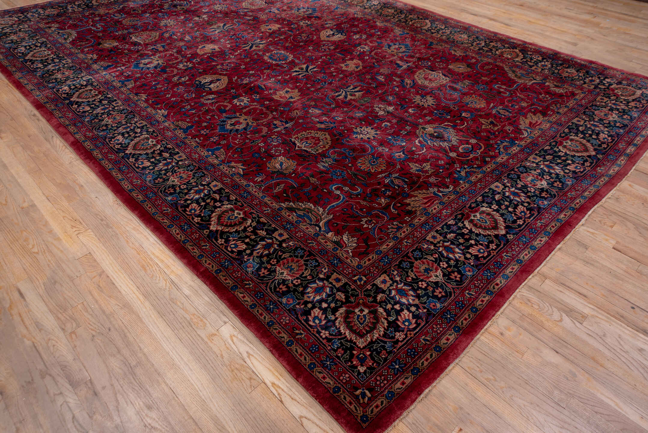 10' x 14' one-of-a-kind handmade antique Lahor large size rug. Color palette: red, navy, ivory, blue, rust, camel, rose