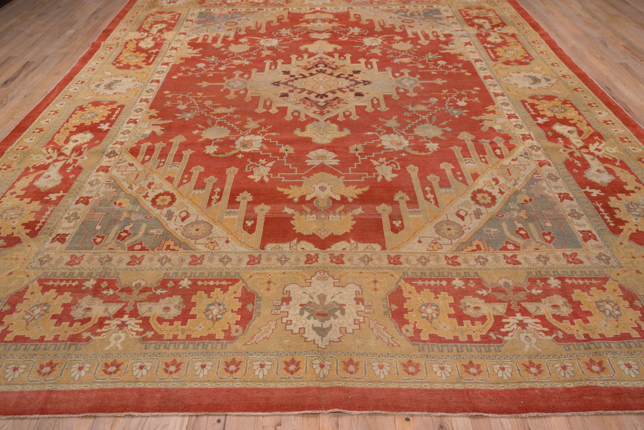 11' x 14' one-of-a-kind handmade antique Amritzar oversize rug. Color palette: terra cotta, camel, ivory, gold, slate, rust