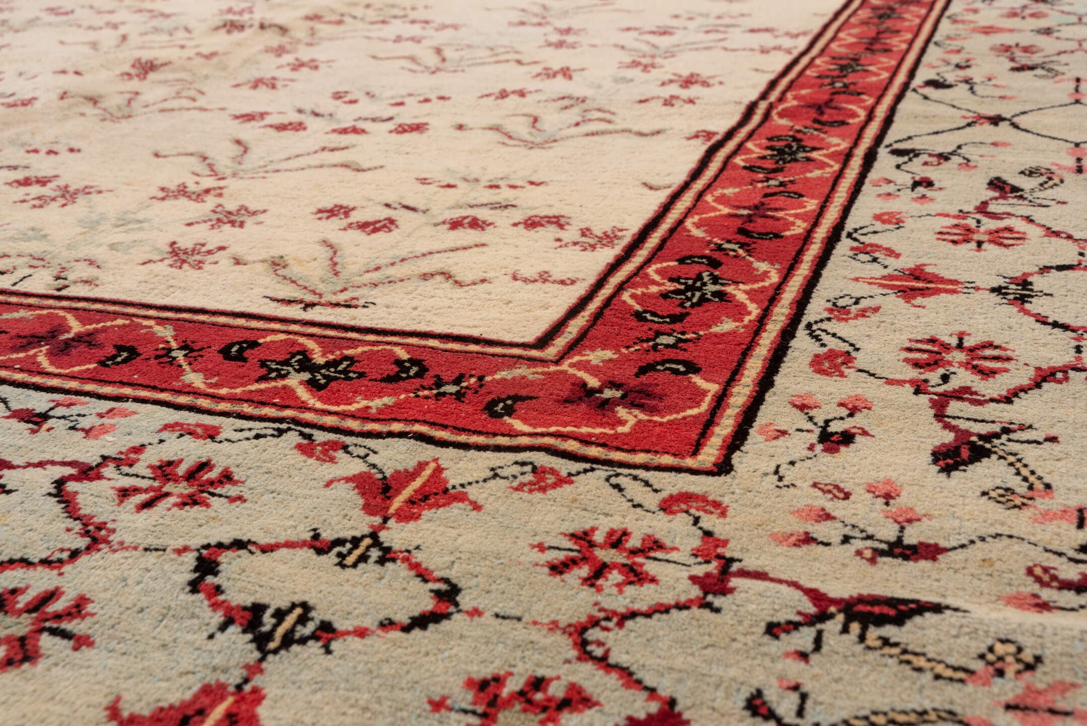 10' x 15' one-of-a-kind handmade vintage Agra rug. Color palette: ivory, coral, rose, sage, taupe, charcoal, terracotta