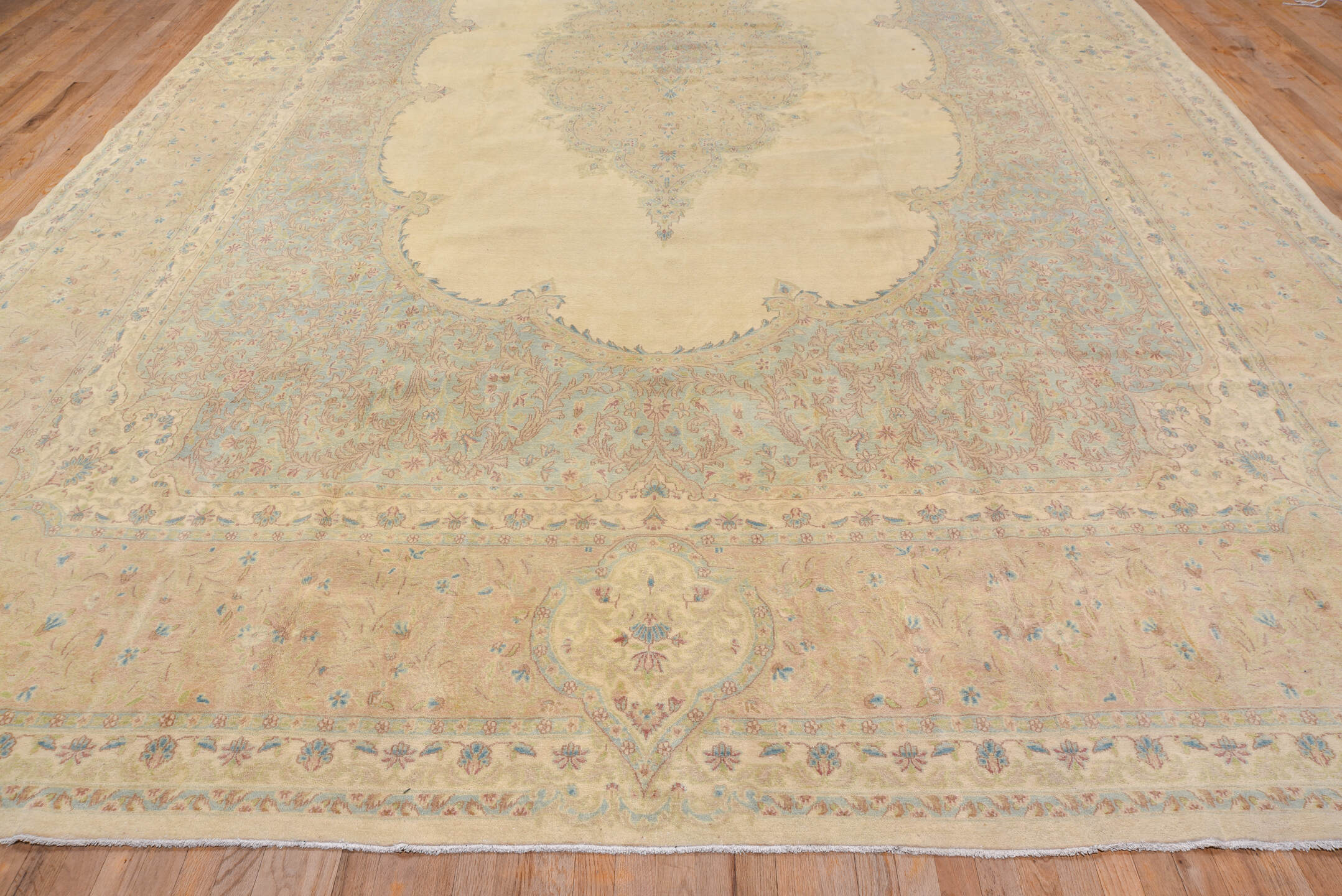 12' x 19' one-of-a-kind handmade vintage Kerman oversize rug. Color palette: ivory, beige, sky blue, taupe, blush, cream