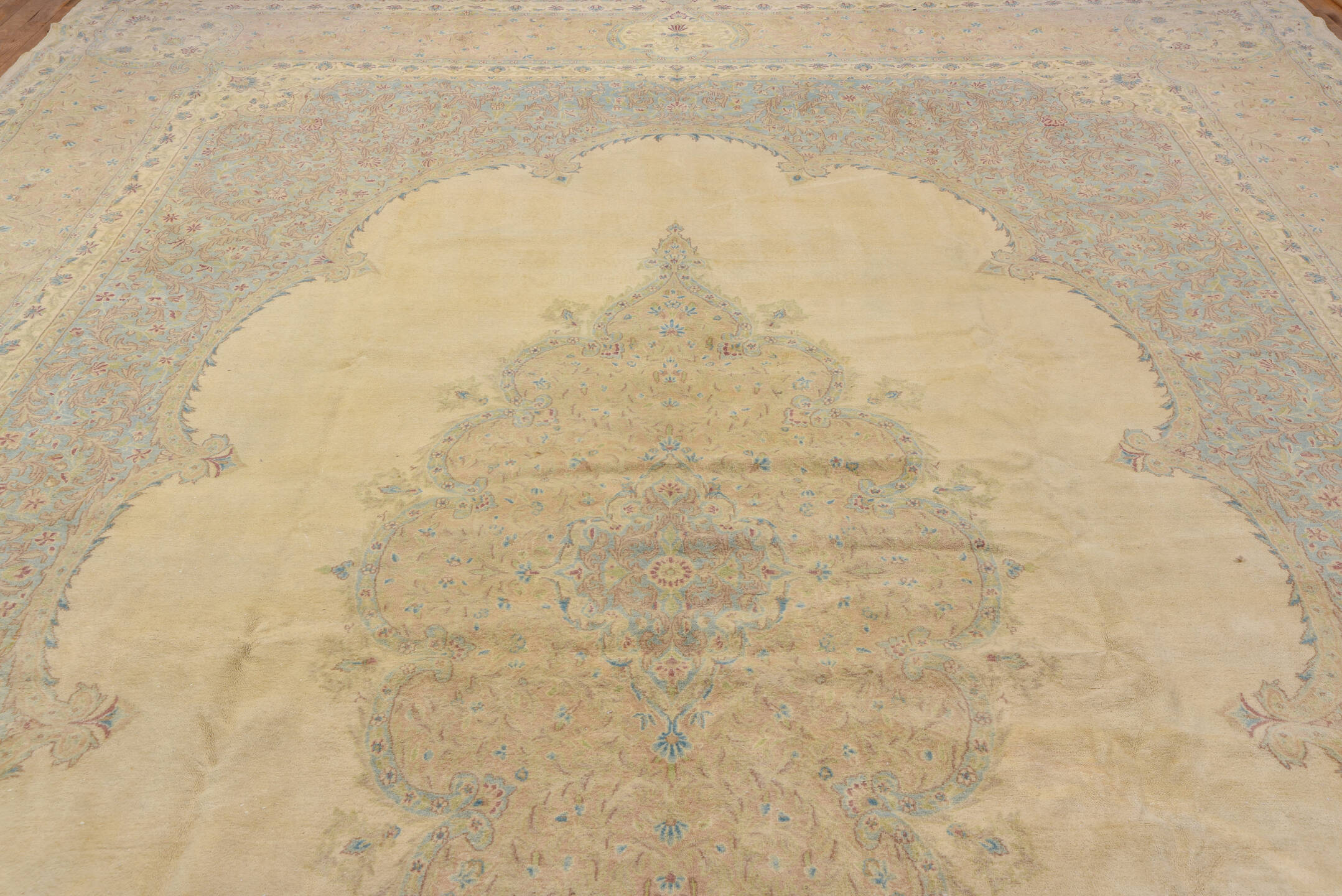 12' x 19' one-of-a-kind handmade vintage Kerman oversize rug. Color palette: ivory, beige, sky blue, taupe, blush, cream