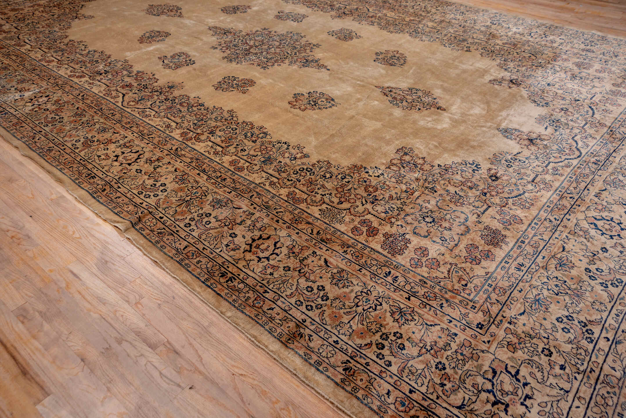 12' x 18' one-of-a-kind handmade antique Sarouk oversize rug. Color palette: beige, ivory, slate, taupe, rust, camel