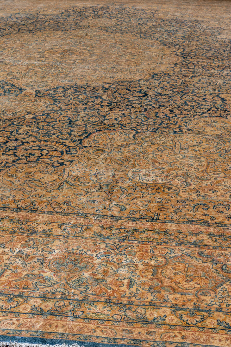 13' x 21' one-of-a-kind handmade antique Kerman oversize rug. Color palette: camel, navy, ivory, taupe, slate, beige, blue