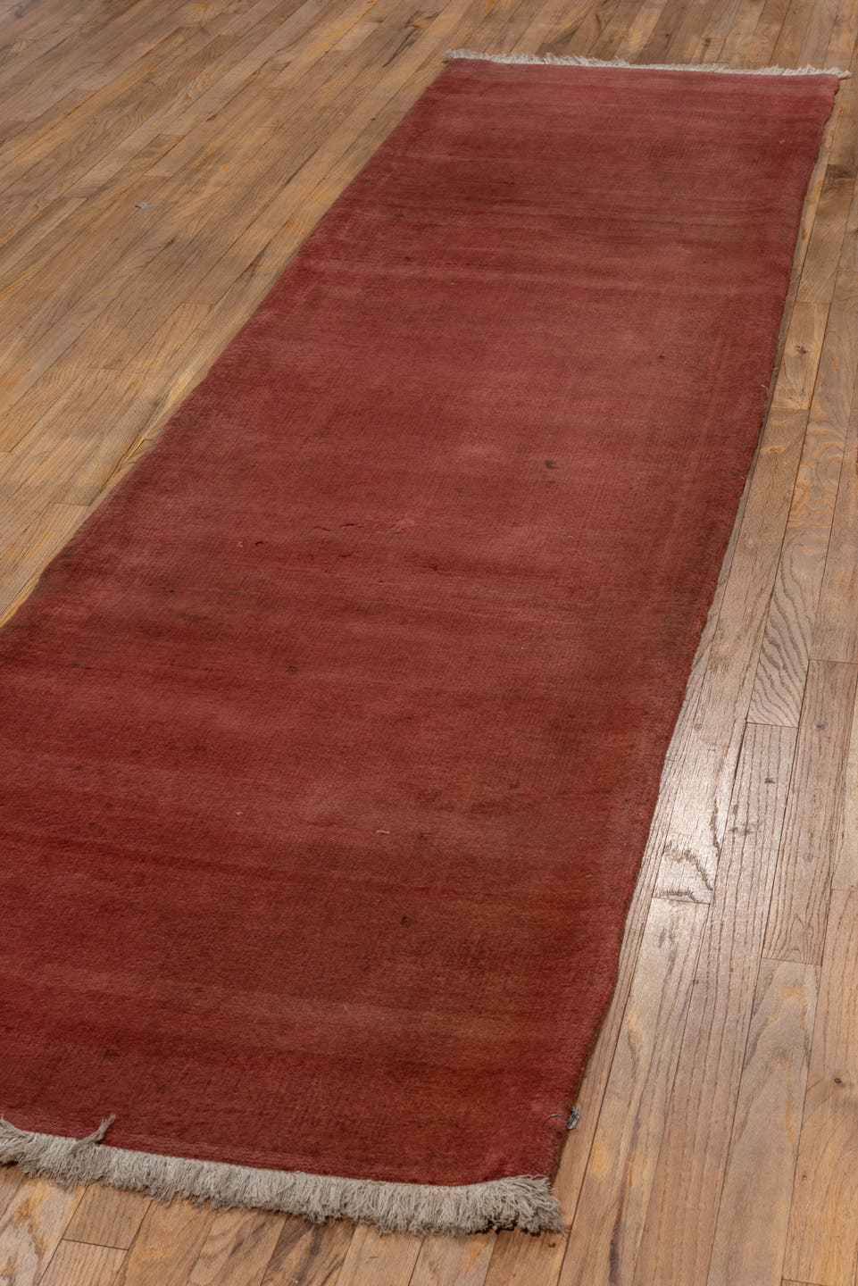 2' x 11' one-of-a-kind handmade vintage Chinese runner rug. Color palette: terra cotta, rust, sienna, rose, taupe
