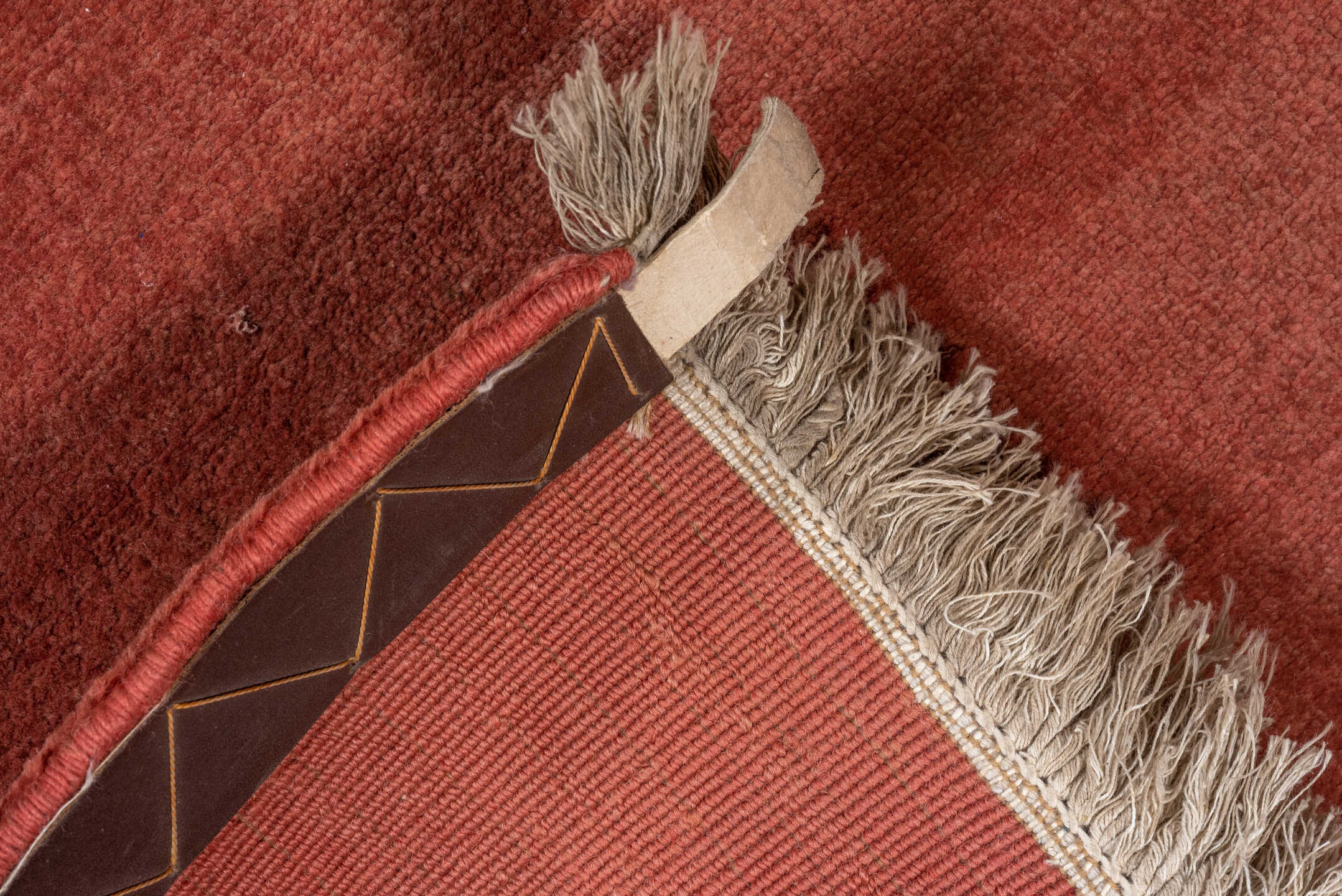 2' x 11' one-of-a-kind handmade vintage Chinese runner rug. Color palette: terra cotta, rust, sienna, rose, taupe