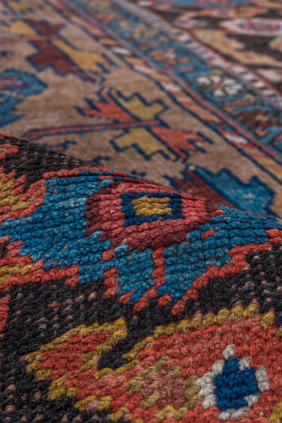 3' x 8' one-of-a-kind handmade vintage Kurd runner rug. Color palette: arapawa, blue, brown, gray, pink, red, redwood