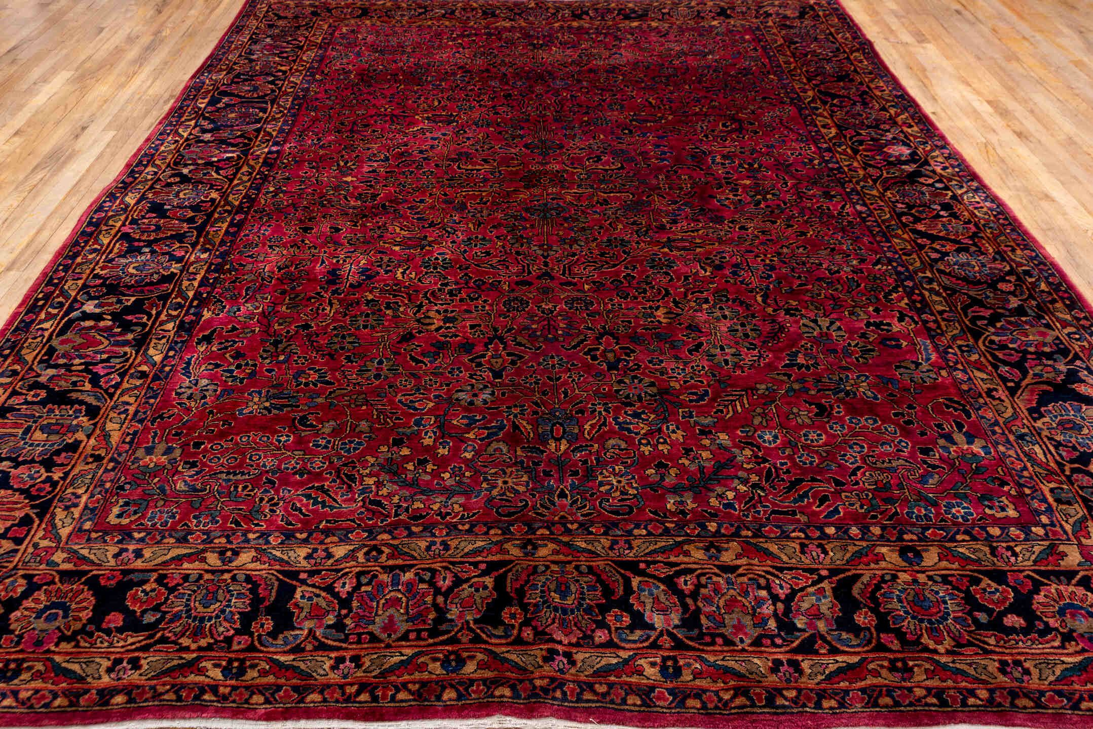 9' x 12' one-of-a-kind handmade antique Sarouk large size rug. Color palette: red, navy, rose, ivory, burgundy, cobalt