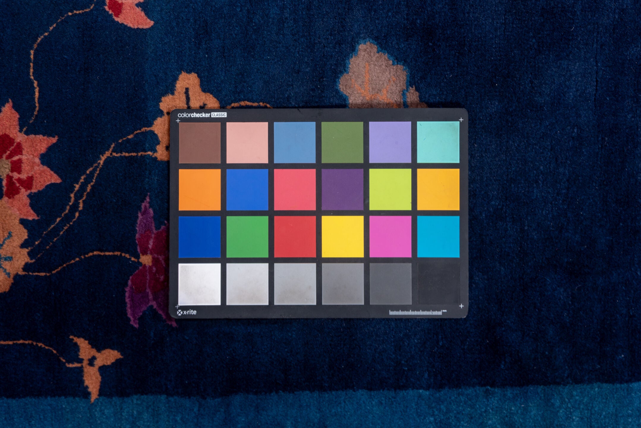 8' x 9' one-of-a-kind handmade vintage Chinese rug. Color palette: blue, brown, gray, light gray, off-white, pink, red, snow