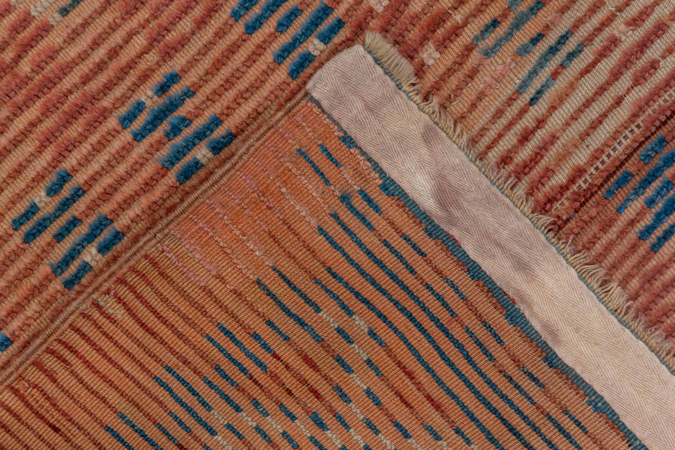 4' x 9' one-of-a-kind handmade vintage Moroccan runner rug. Color palette: blue, brown, gray, pink