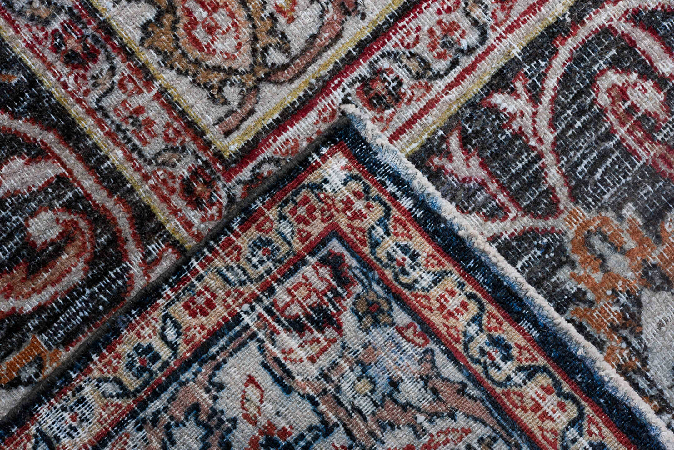 13' x 17' one-of-a-kind handmade vintage Khorassan oversize rug. Color palette: black, blue, brown, gray, pink, red