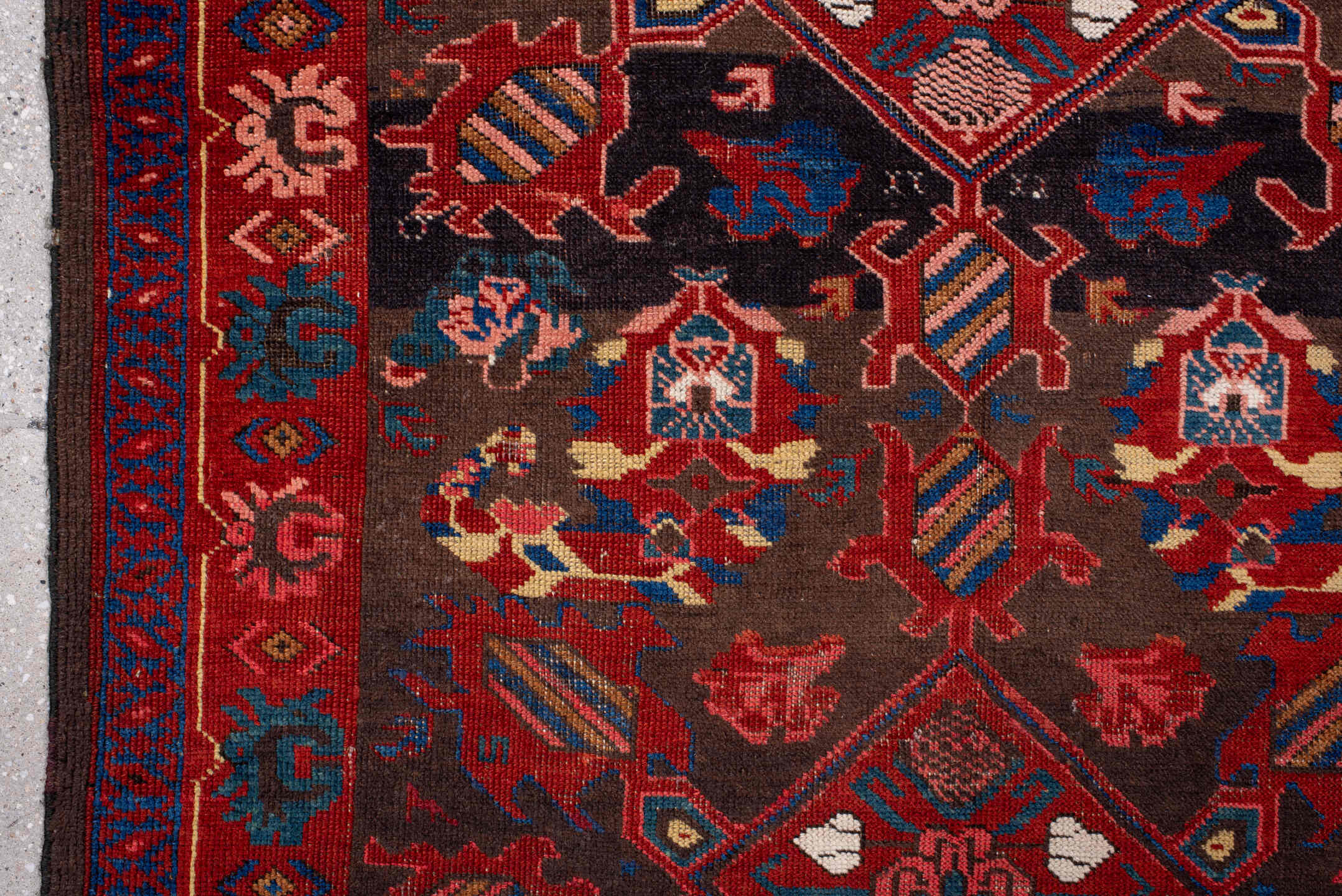 3' x 6' one-of-a-kind handmade vintage Zeichur small size rug. Color palette: brown, red, blue, crimson, ivory, pink
