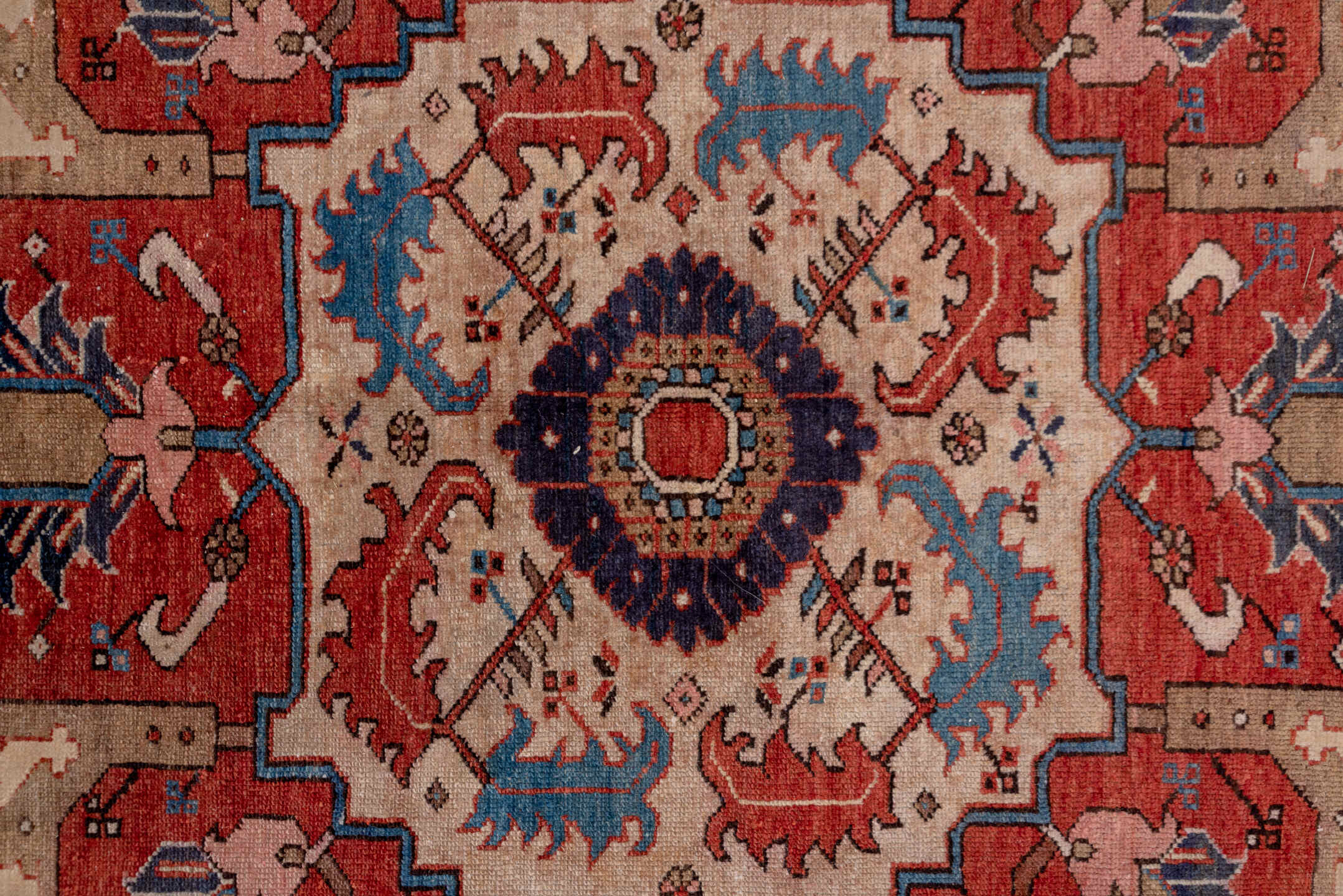 12' x 18' one-of-a-kind handmade antique Serapi oversize rug. Color palette: ivory, rust, brick red, indigo, sky blue, camel