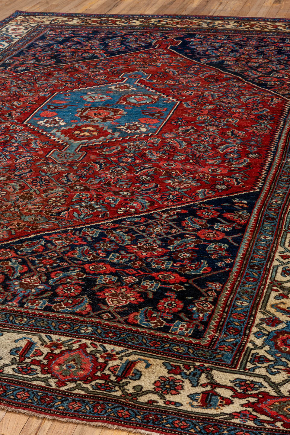 7' x 10' one-of-a-kind handmade antique Bidjar large size rug. Color palette: red, navy, ivory, sky blue, rust, camel