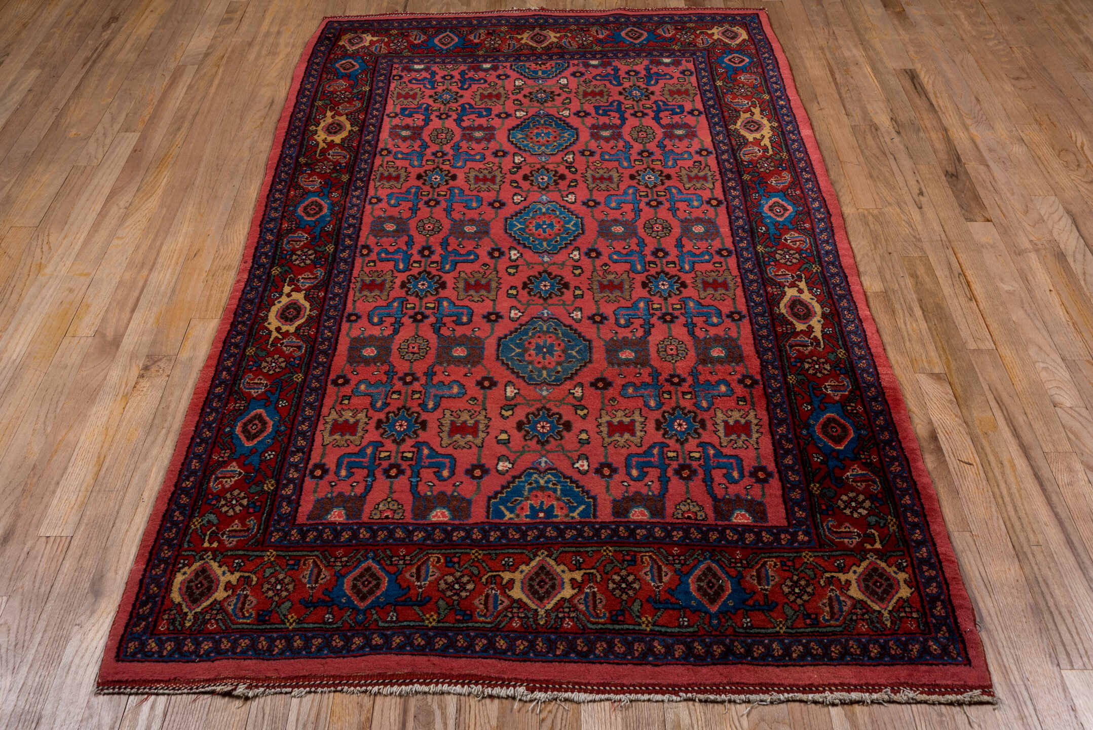4' x 7' one-of-a-kind handmade antique Bidjar rug. Color palette: rose, crimson, cobalt, navy, ivory, burgundy, camel, pink