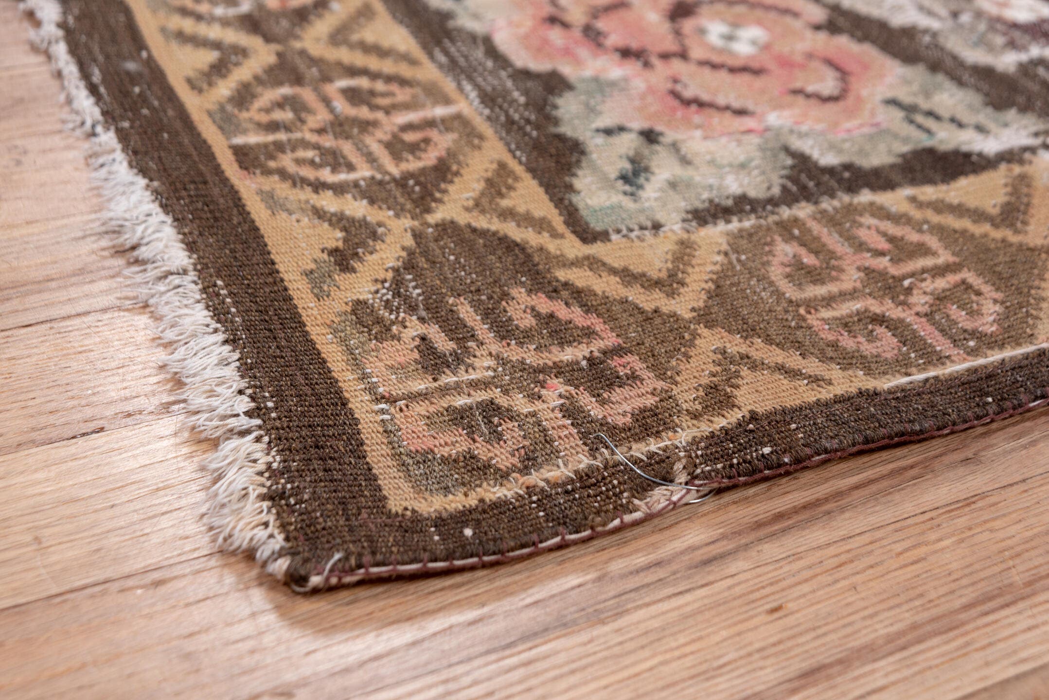 5' x 7' one-of-a-kind handmade antique Kilim rug. Color palette: brown, rose, camel, sage, taupe, ivory, coral, pink, red
