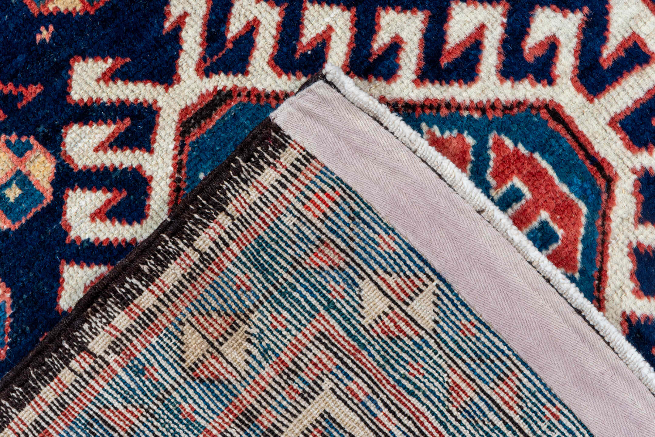 3' x 11' one-of-a-kind handmade antique NW Persian runner rug. Color palette: navy, ivory, rust, indigo, rose, sky_blue