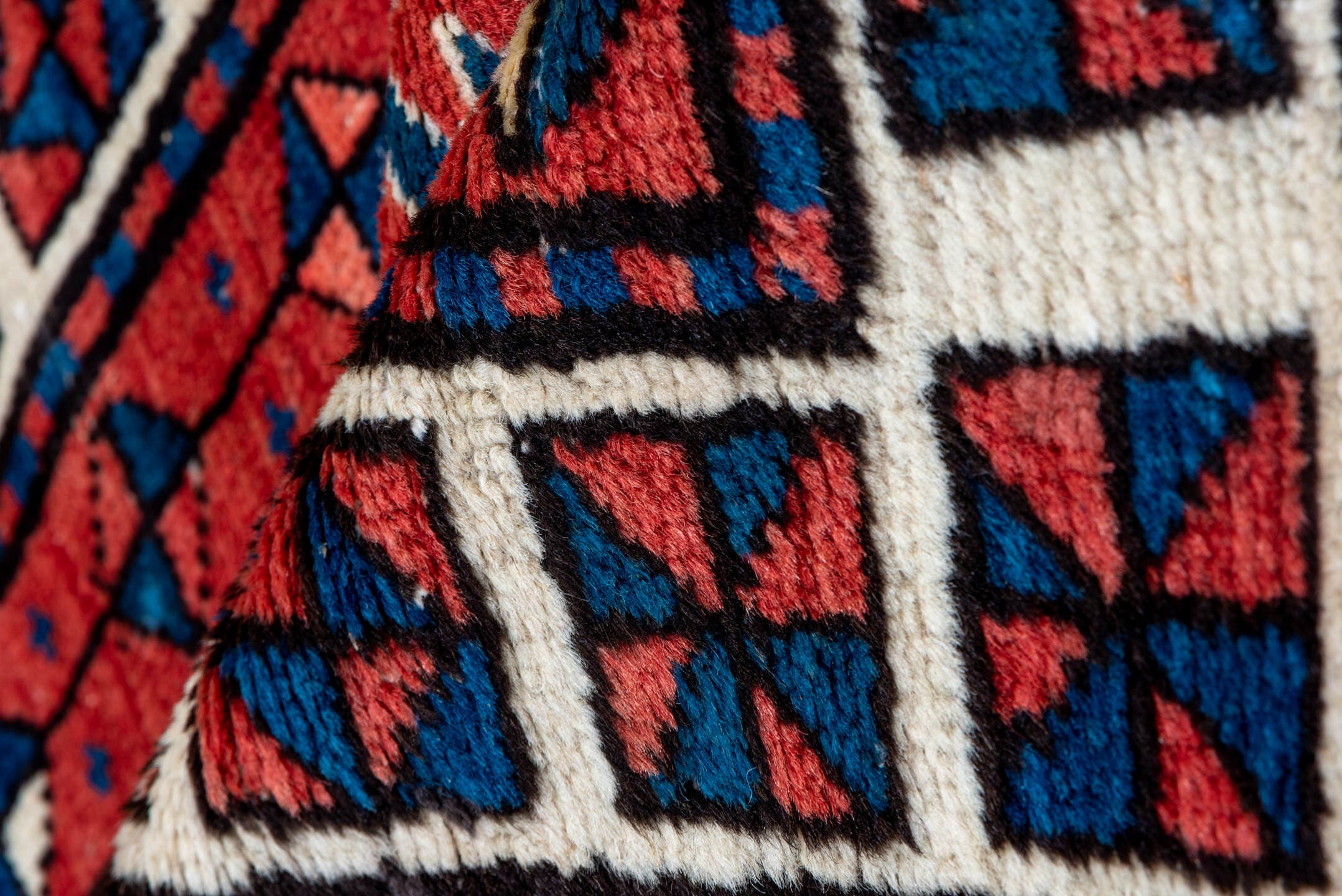 3' x 11' one-of-a-kind handmade antique NW Persian runner rug. Color palette: navy, ivory, rust, indigo, rose, sky_blue