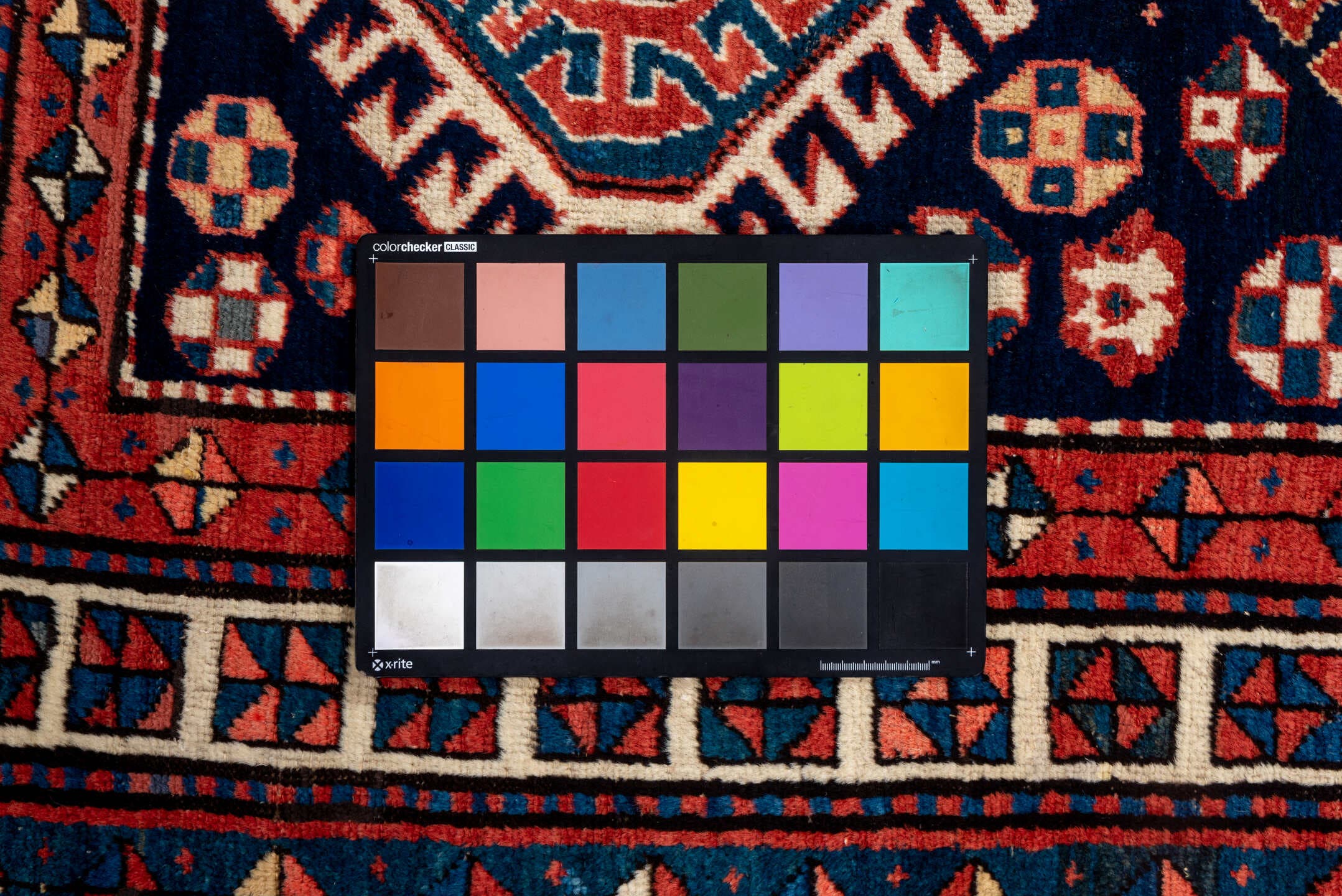 3' x 11' one-of-a-kind handmade antique NW Persian runner rug. Color palette: navy, ivory, rust, indigo, rose, sky_blue