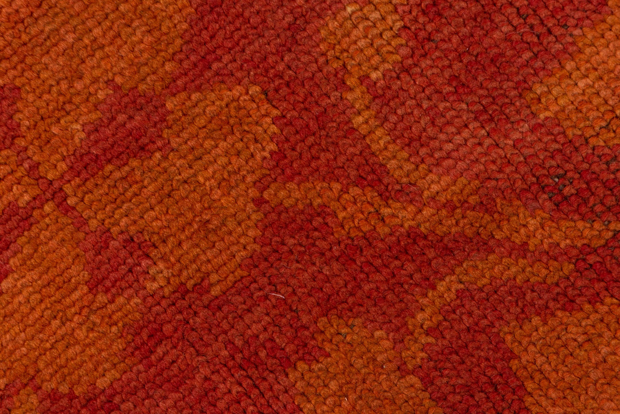 6' x 14' one-of-a-kind handmade handmade Donegal rug. Color palette: terra cotta, rust, coral, gold, slate, olive