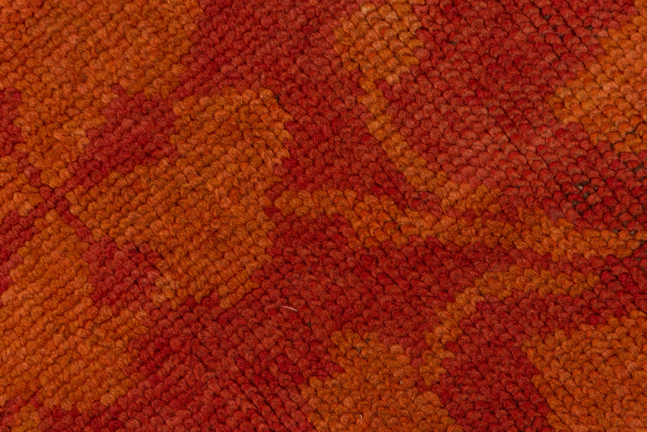 6' x 14' one-of-a-kind handmade handmade Donegal rug. Color palette: terra cotta, rust, coral, gold, slate, olive