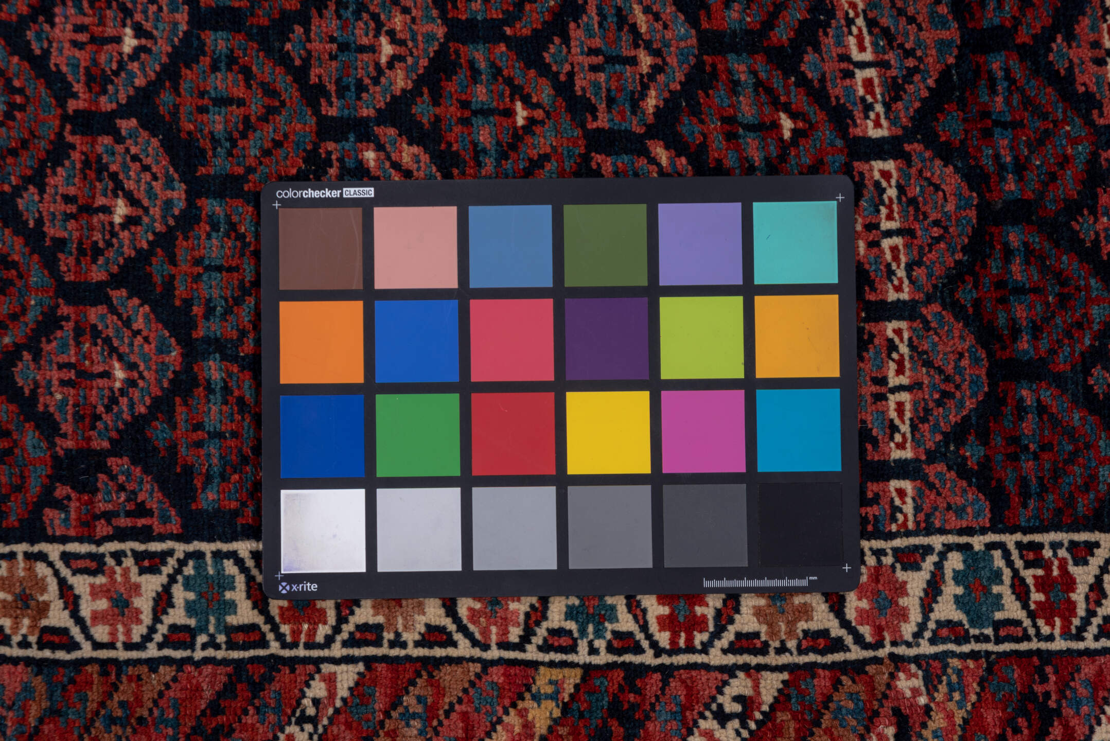 3' x 16' one-of-a-kind handmade vintage Kurd runner rug. Color palette: black, blue, brown, gray, pink, red