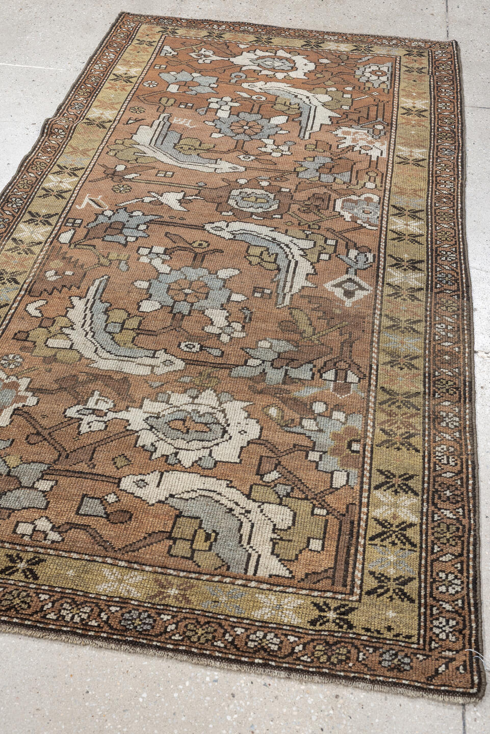 3' x 6' one-of-a-kind handmade antique Kurd rug. Color palette: terra cotta, ivory, sage, slate, camel, charcoal, taupe