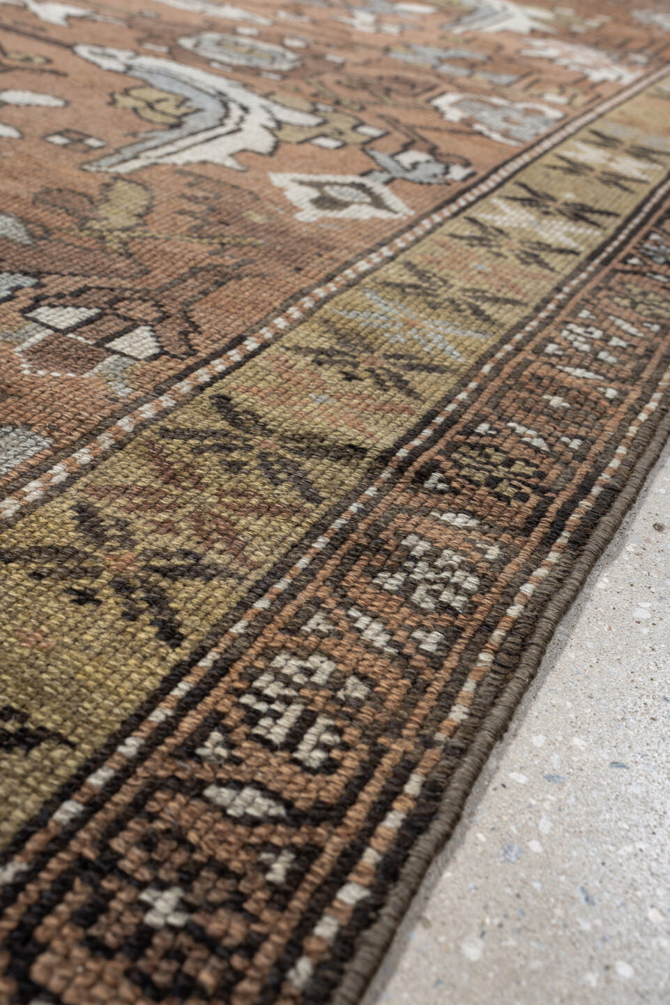 3' x 6' one-of-a-kind handmade antique Kurd rug. Color palette: terra cotta, ivory, sage, slate, camel, charcoal, taupe