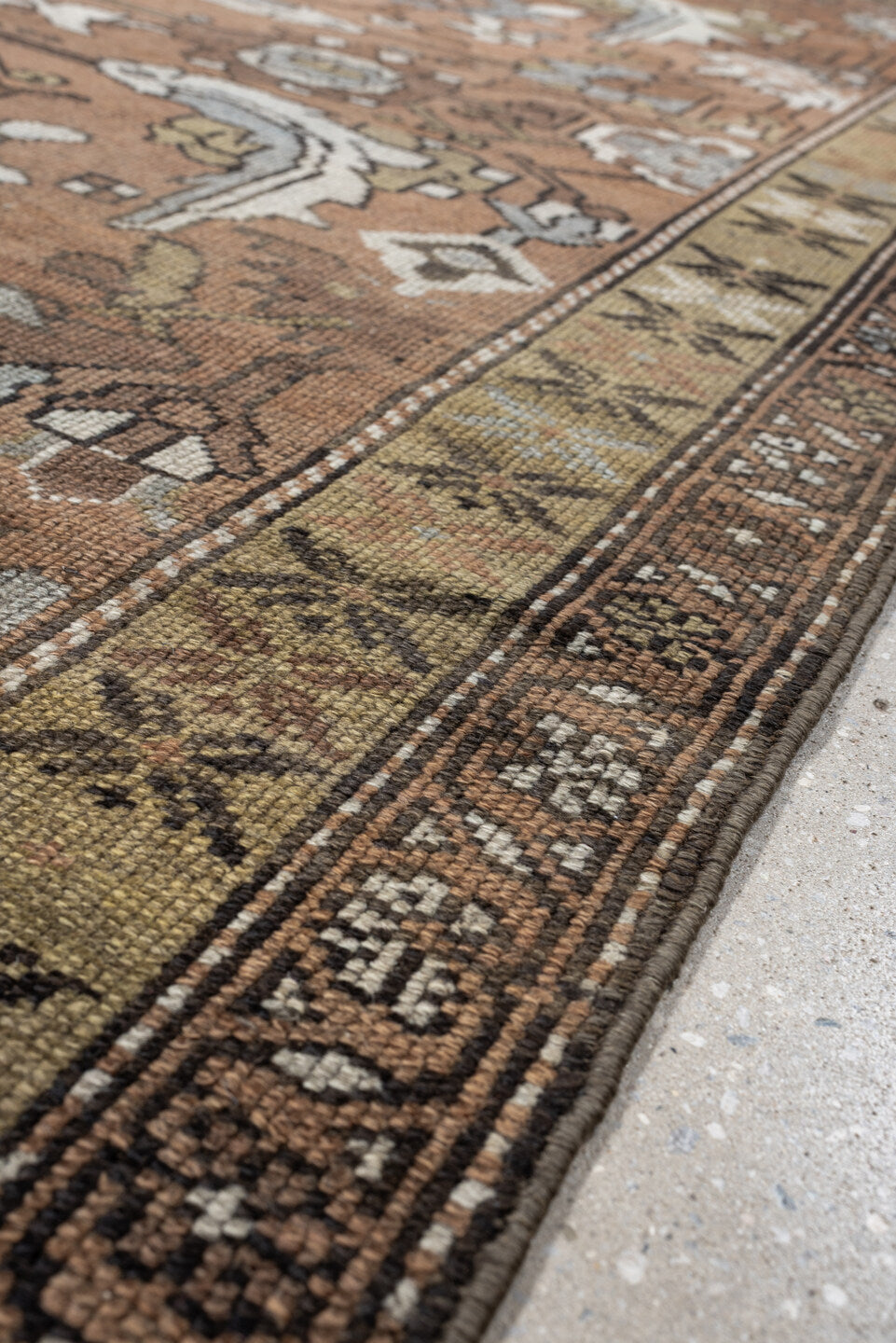 3' x 6' one-of-a-kind handmade antique Kurd rug. Color palette: terra cotta, ivory, sage, slate, camel, charcoal, taupe