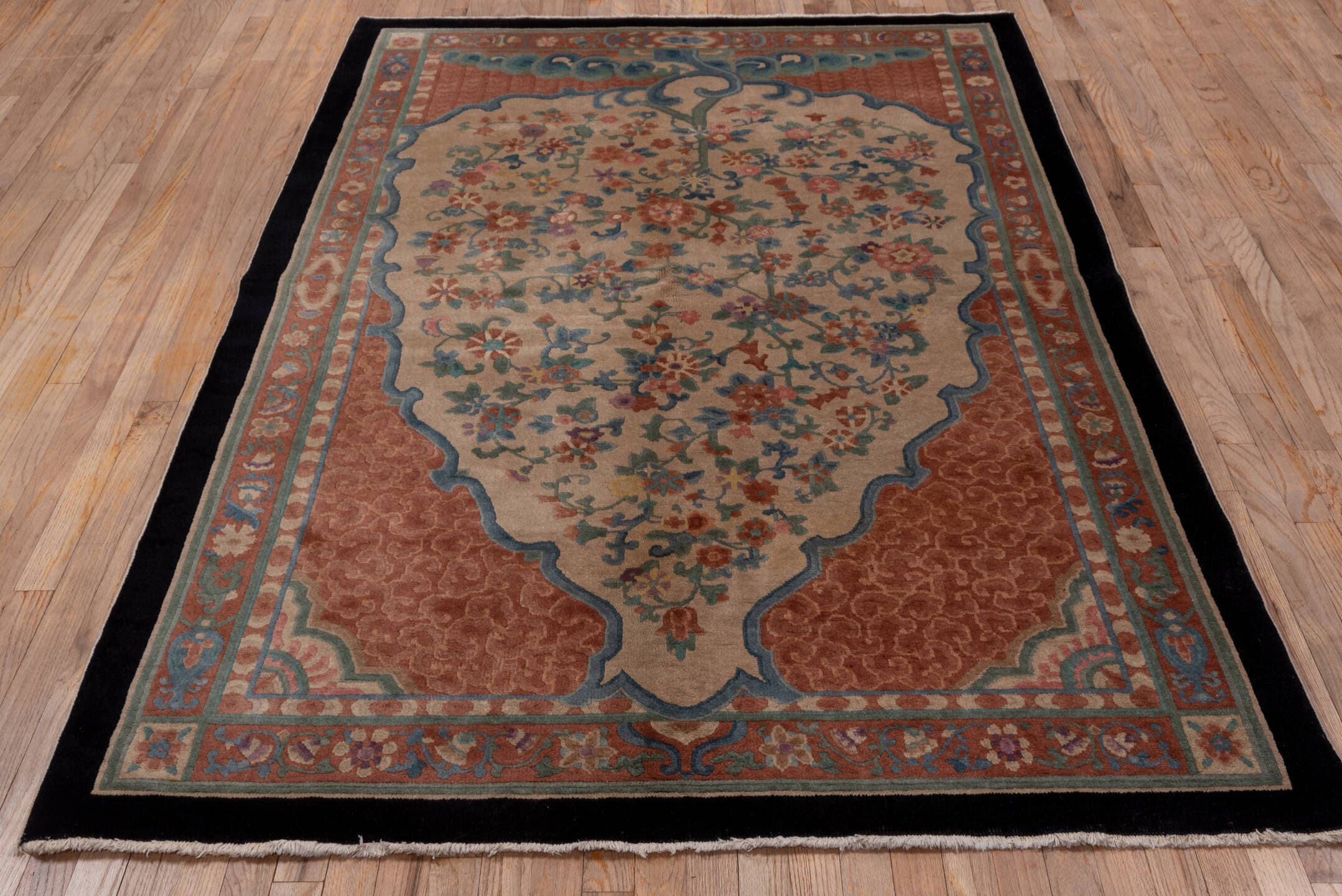 5' x 8' one-of-a-kind handmade antique Chinese medium size rug. Color palette: peach, ivory, blue, coral, teal, navy, rose
