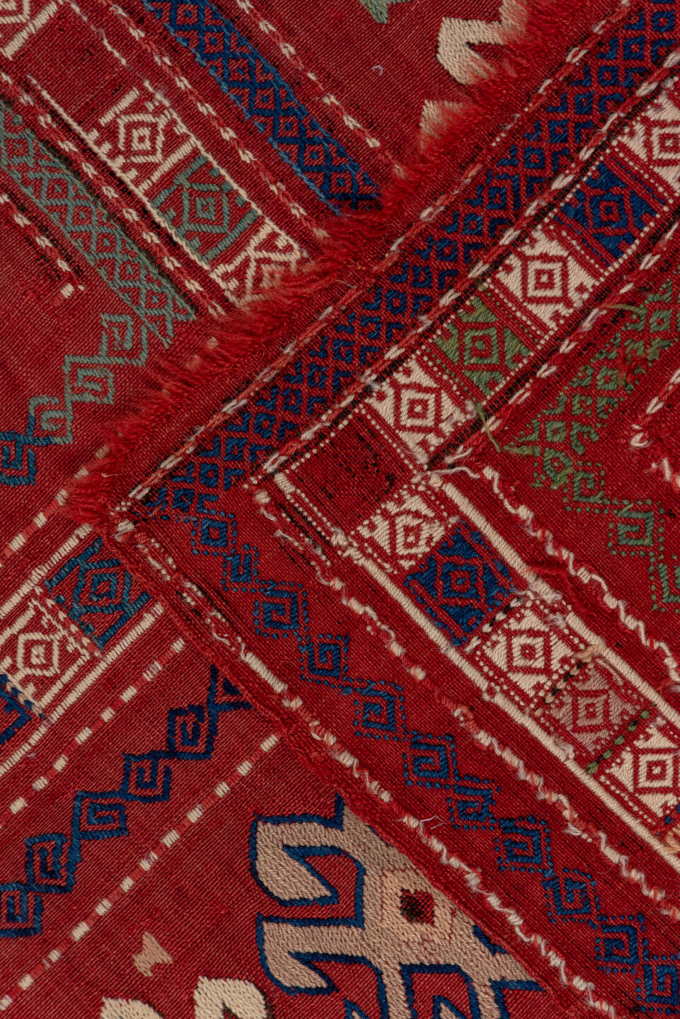 5' x 8' one-of-a-kind handmade vintage Sumak medium size rug. Color palette: blue, brown, fiord, gray, pink, red