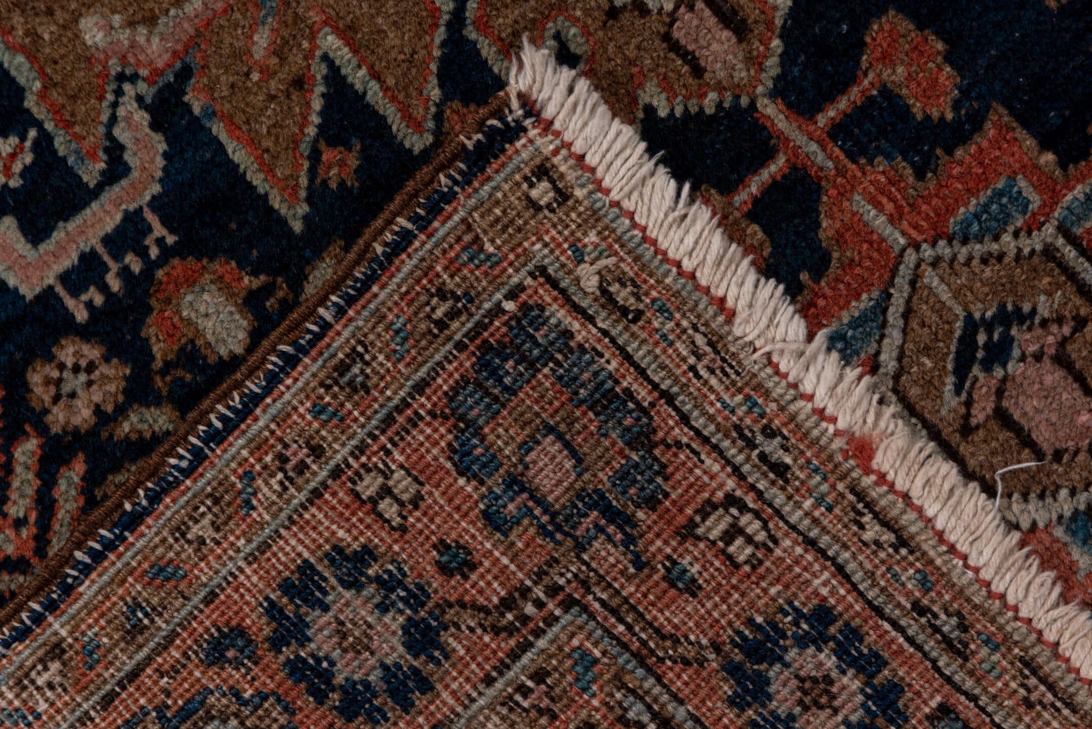 3' x 5' one-of-a-kind handmade antique Heriz small size rug. Color palette: navy, rust, ivory, taupe, slate, camel, rose